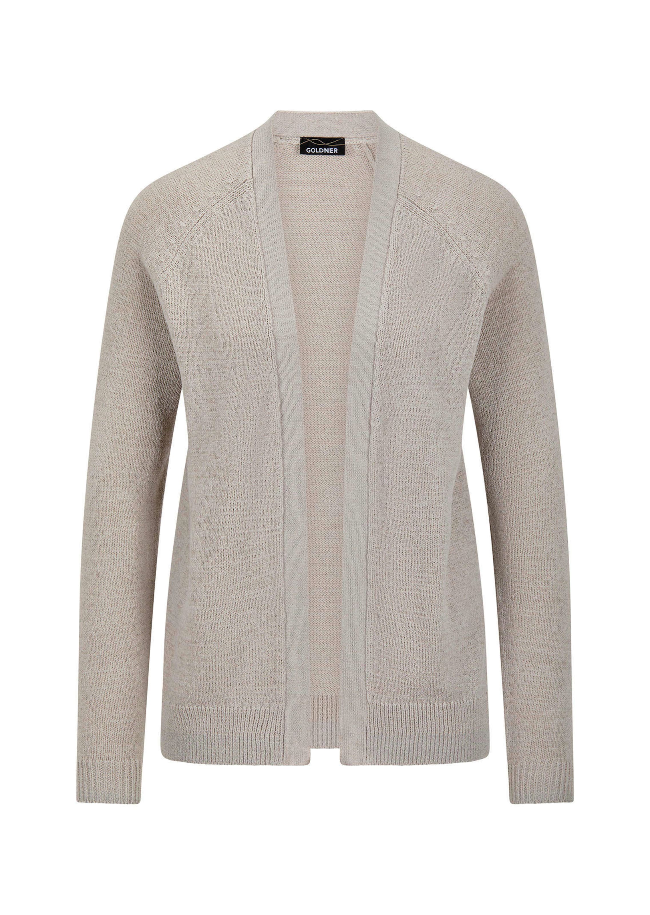 Kort tricot jasje van lintjesgaren
