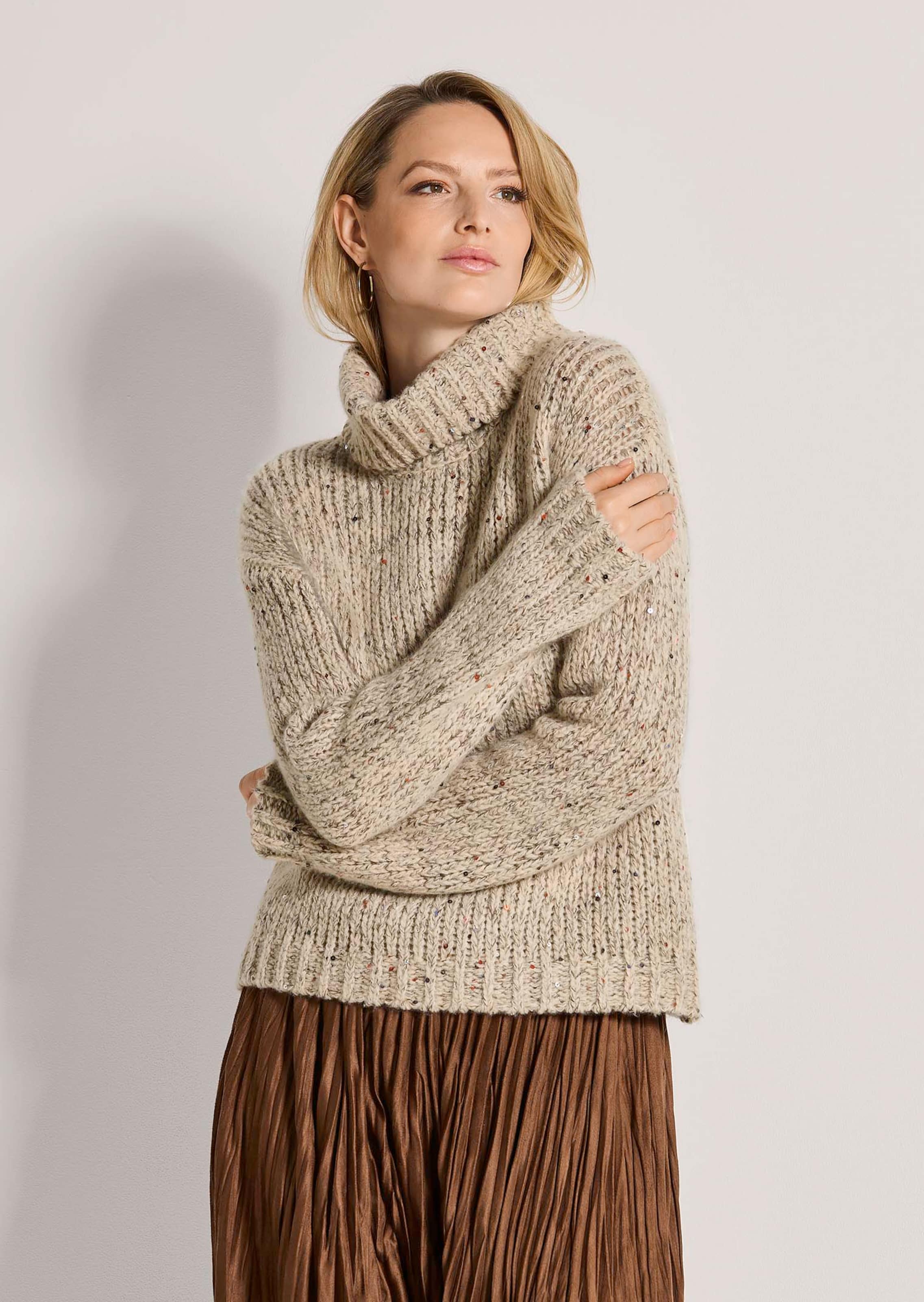 Rollkragenpullover mit Pailletten