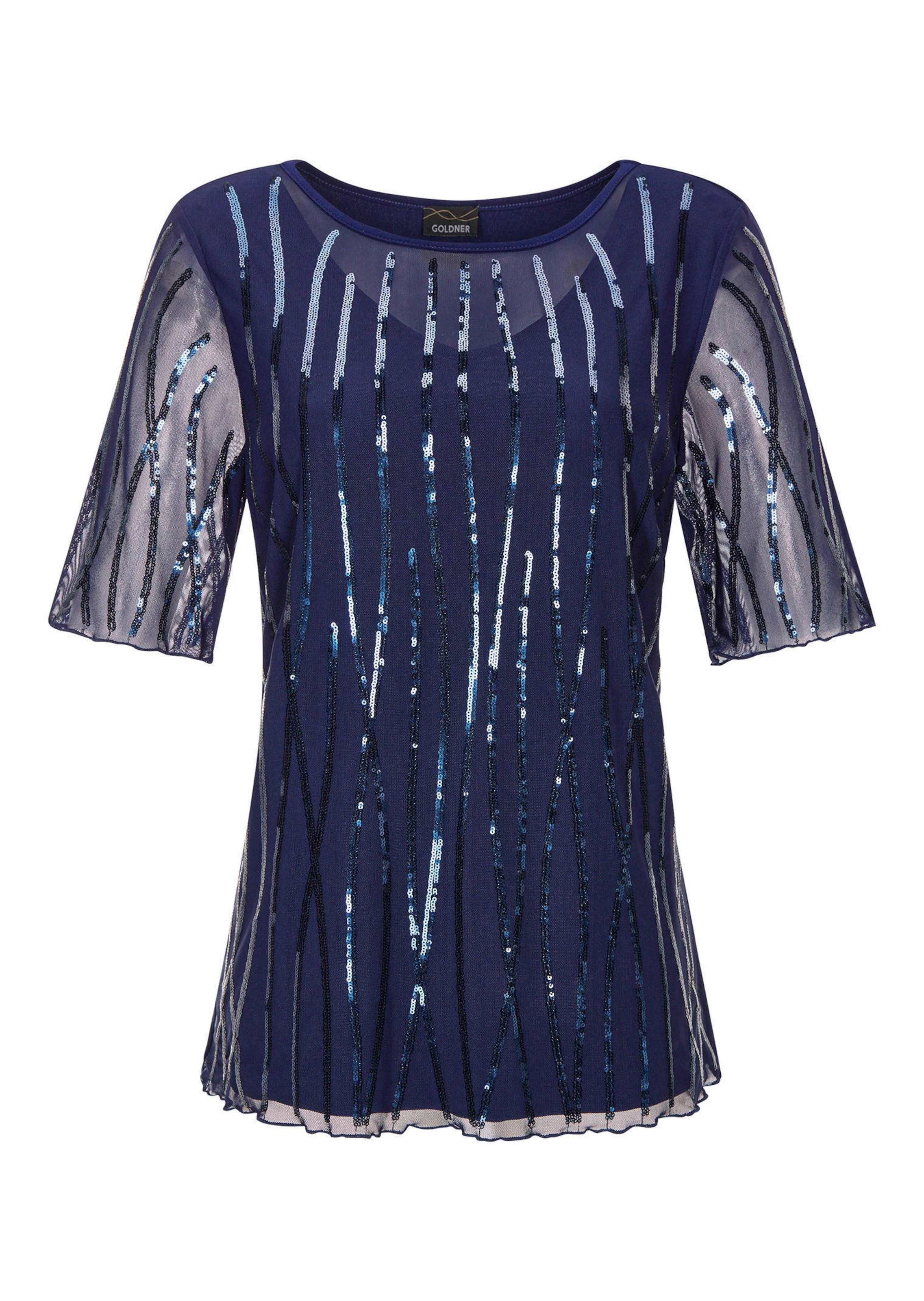 Shirt van mesh bezet met fonkelende pailetten