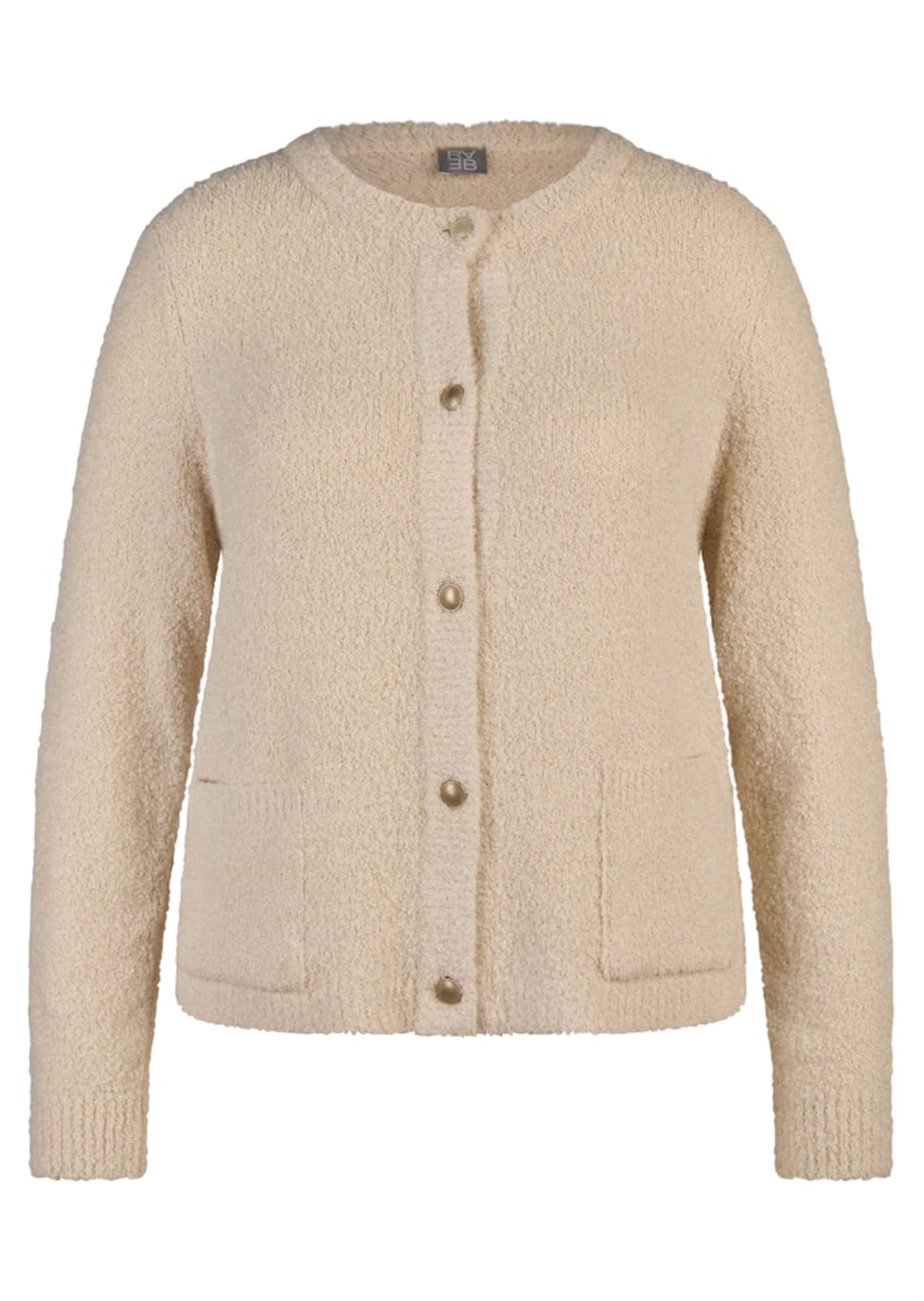 Tricot jasje in bouclélook