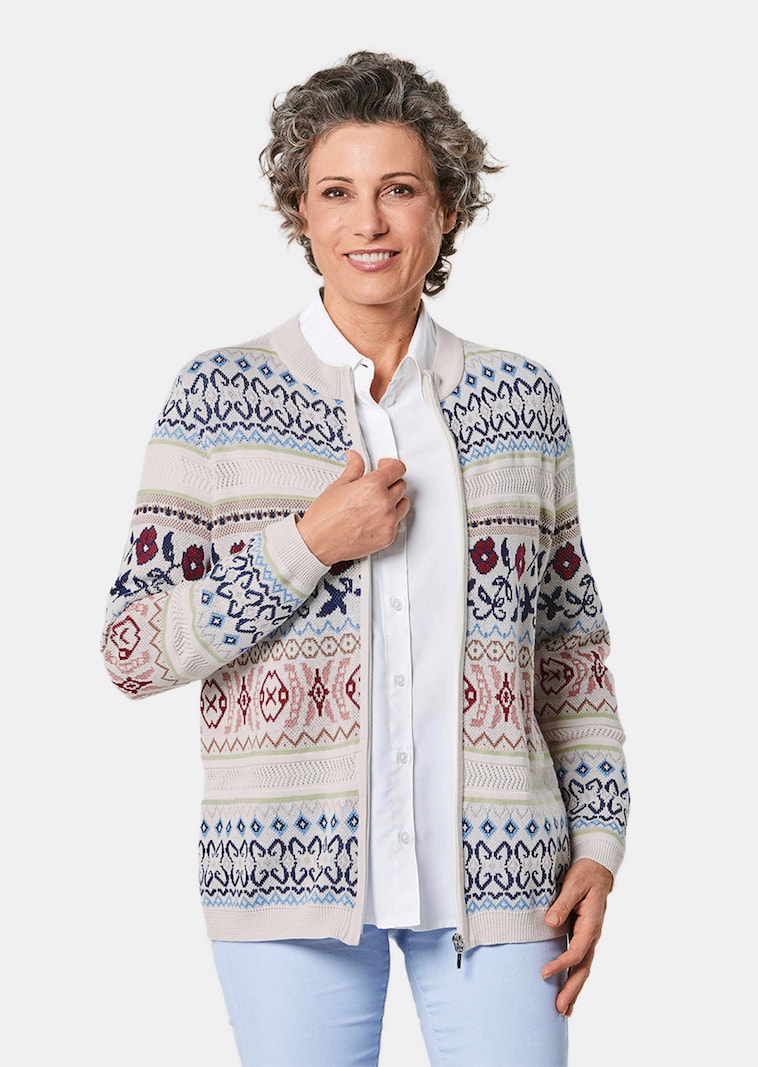 Schitterend tricot jasje met ajourpatroon