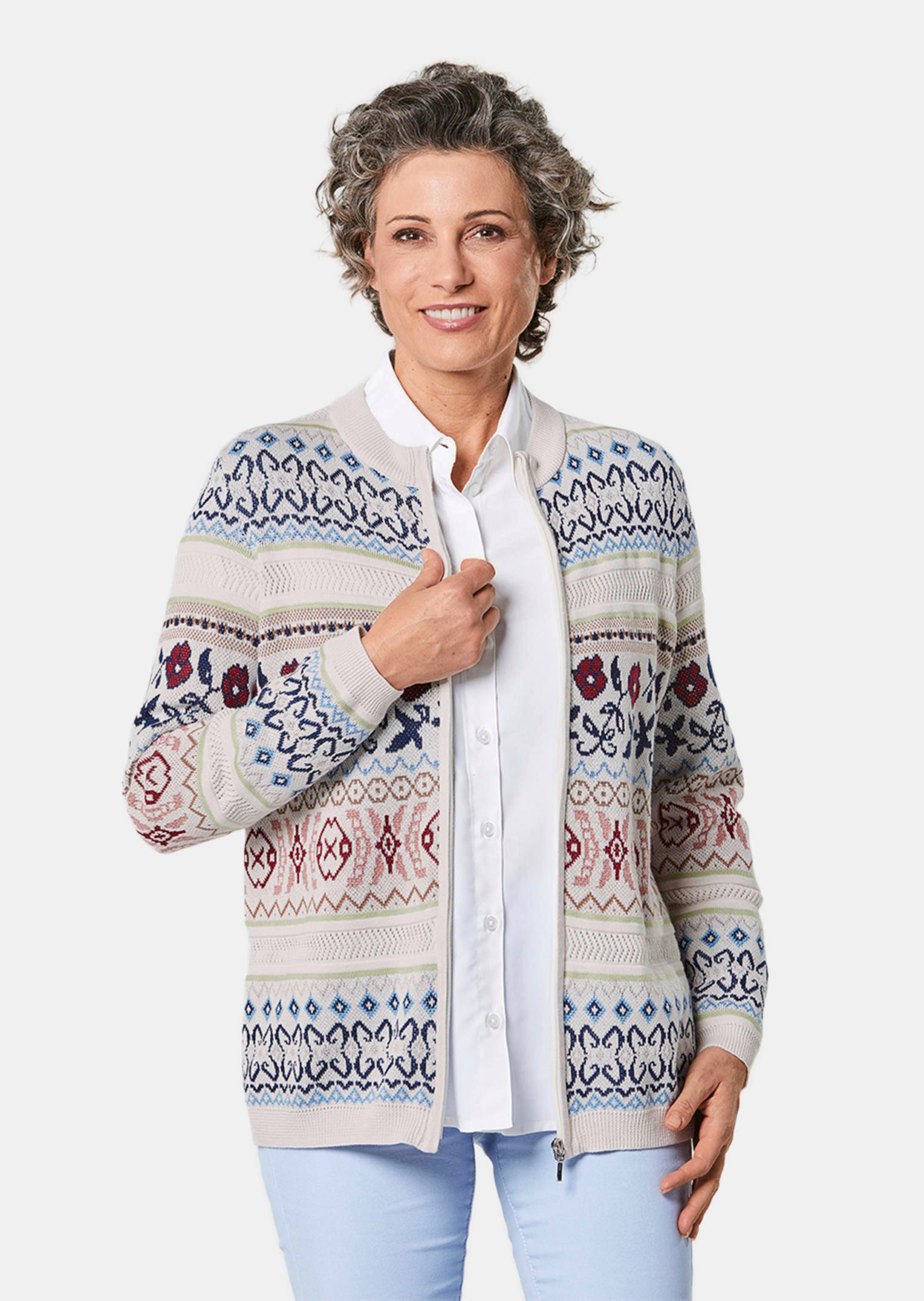 Schitterend tricot jasje met ajourpatroon