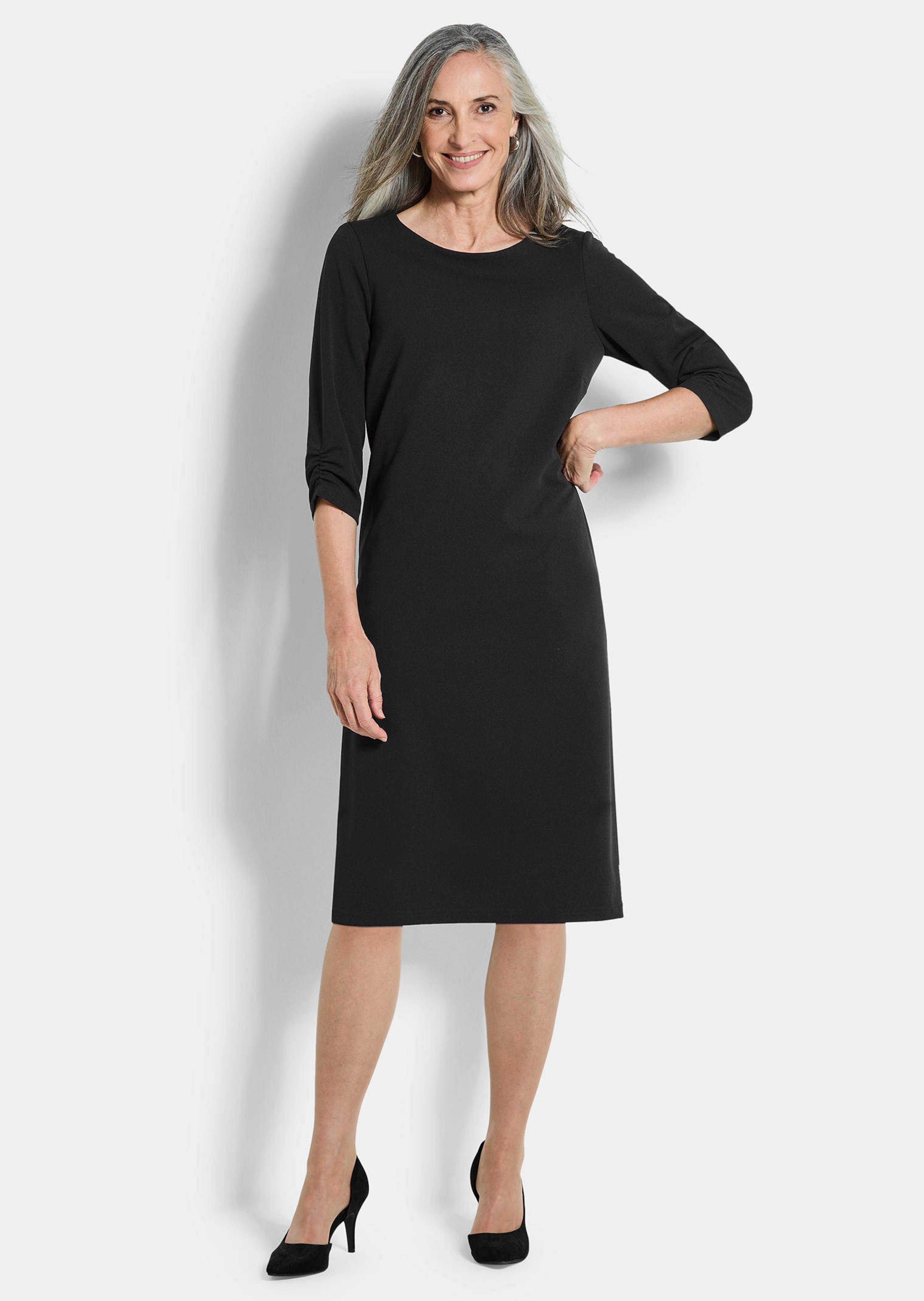 Elegante jurk met aangerimpelde mouwen