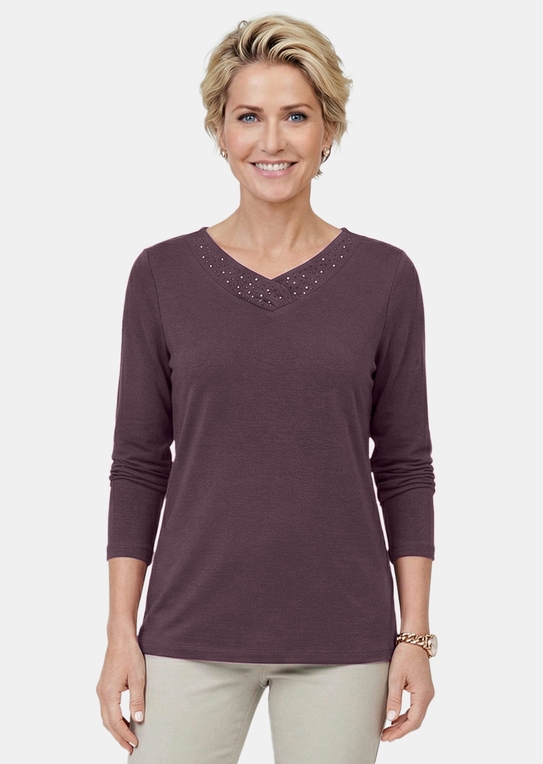T-shirt à manches longues avec encolure en V scintillante