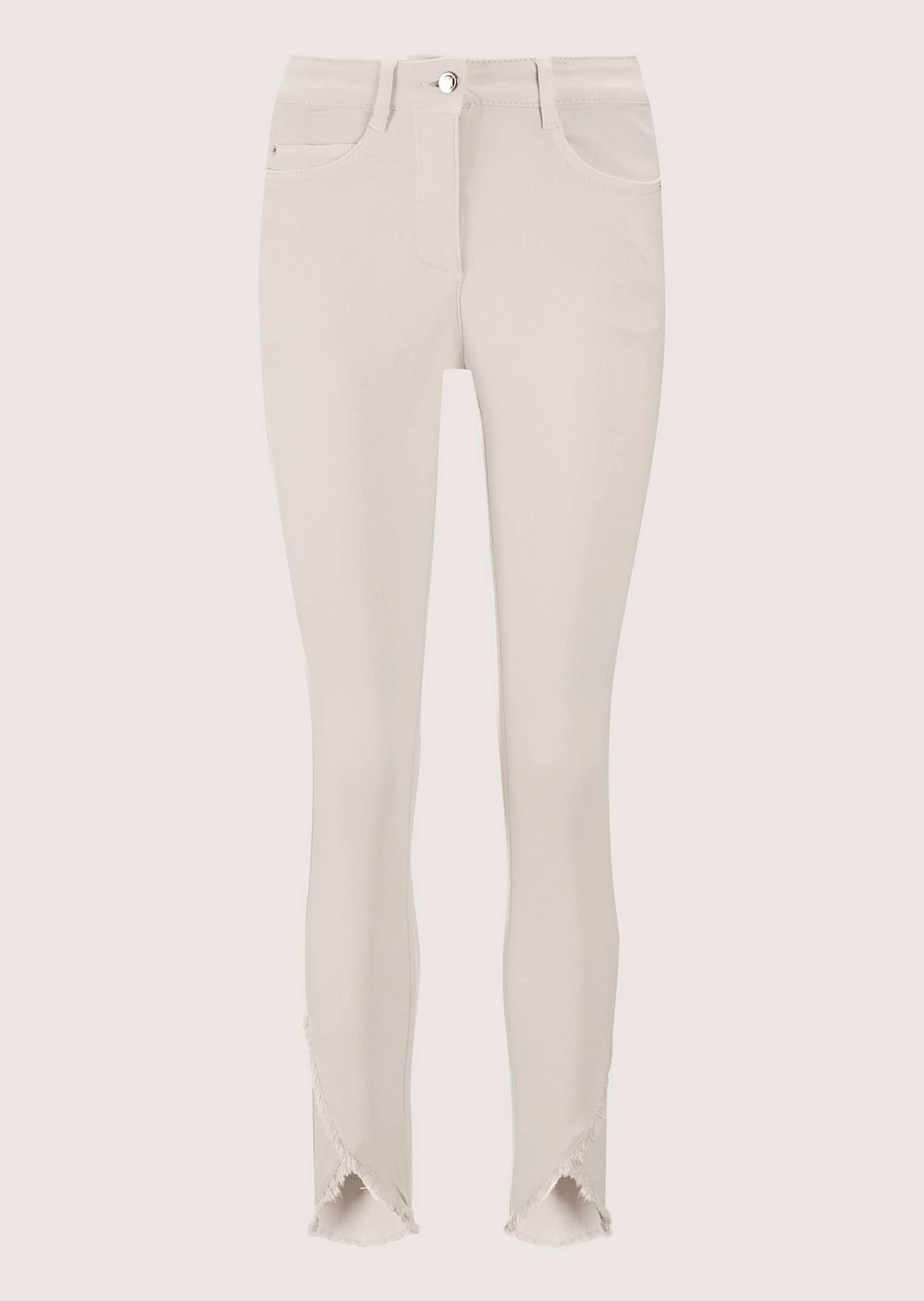 Slim-fit jeans with frayed hem