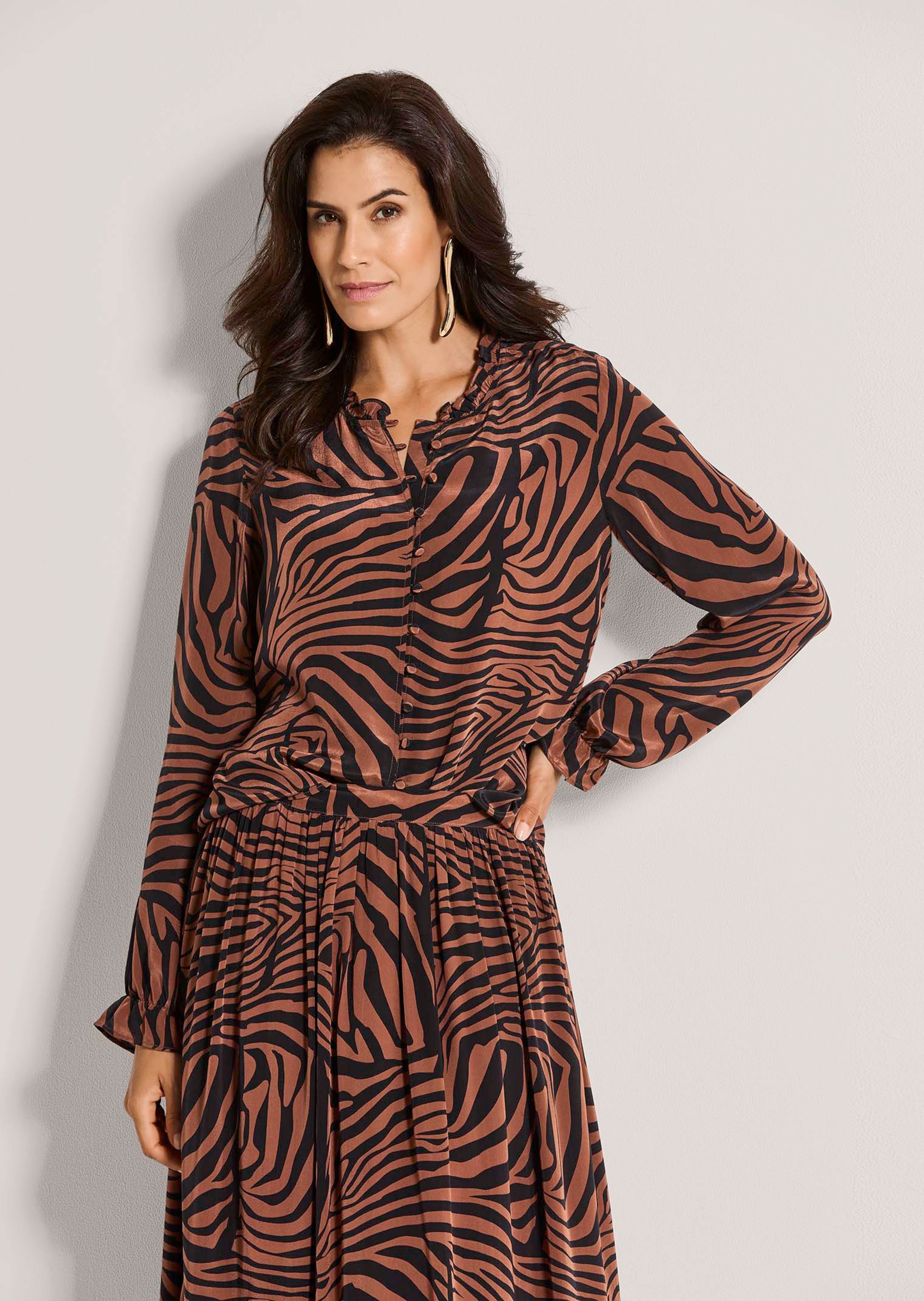Chiffonbluse mit Rüschen und Zebramuster
