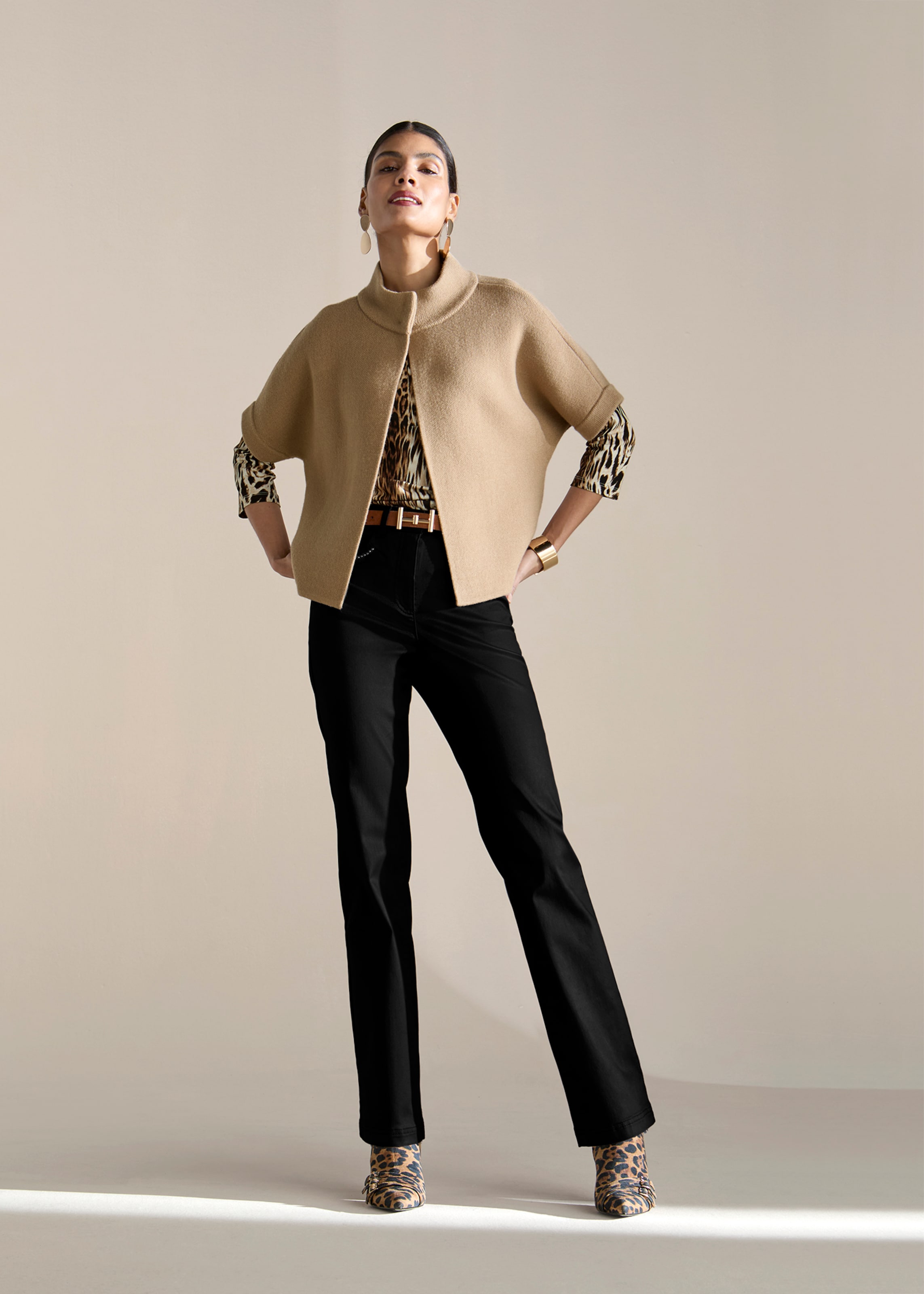 Jean slim enduit avec rivets décoratifs