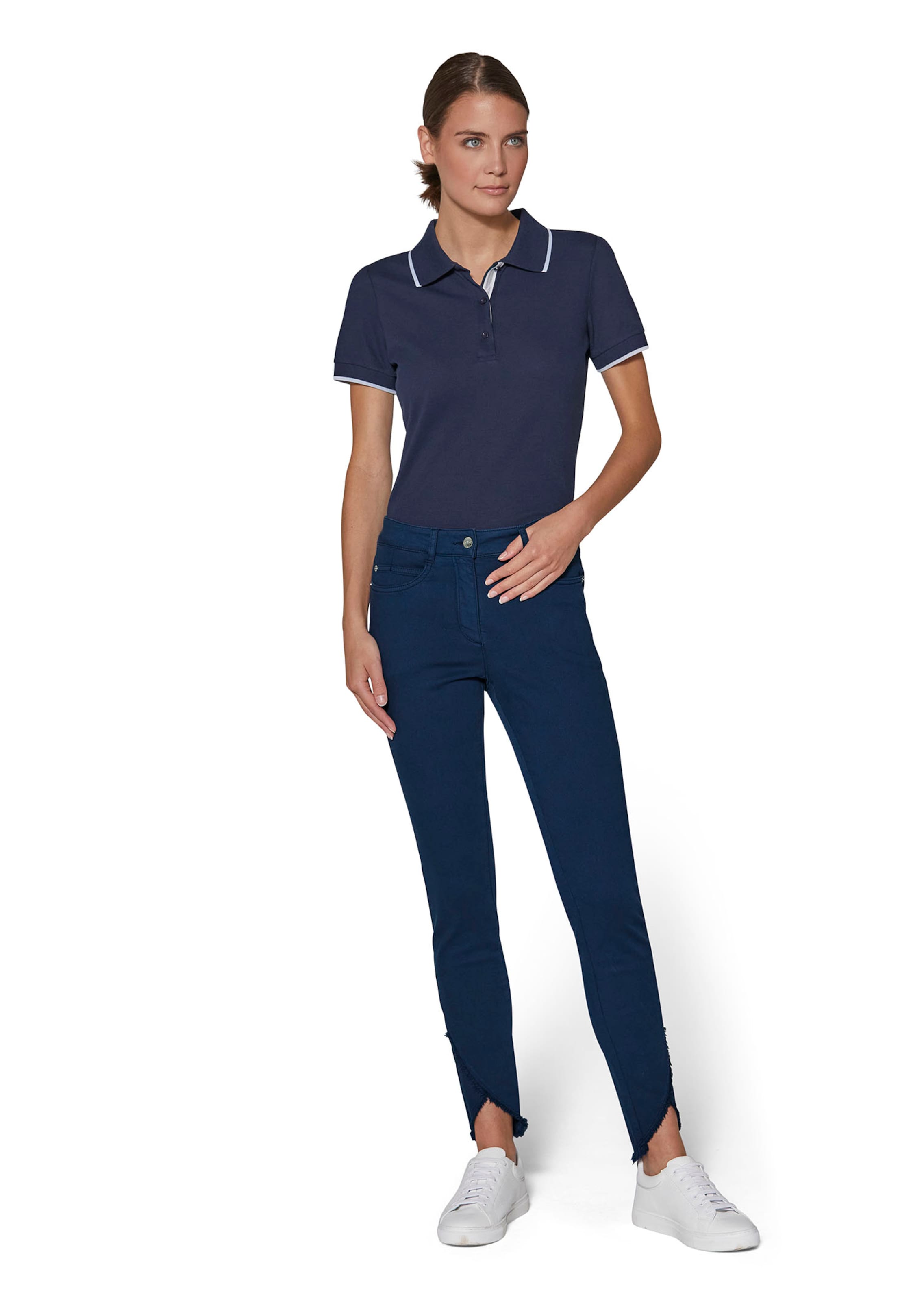 Schlanke Jeans mit Fransensaum