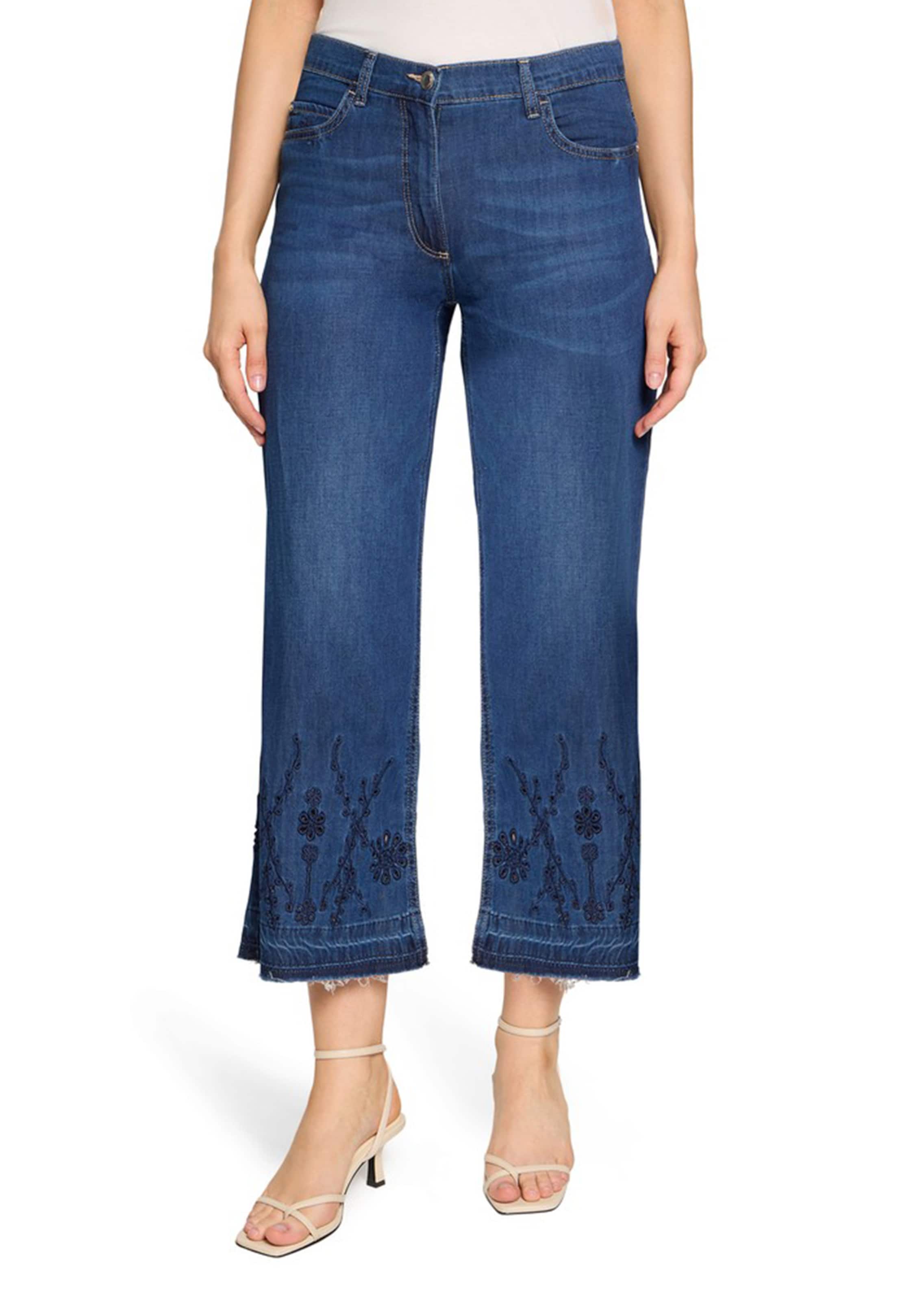 Jeans met Engels borduursel en franjeranden