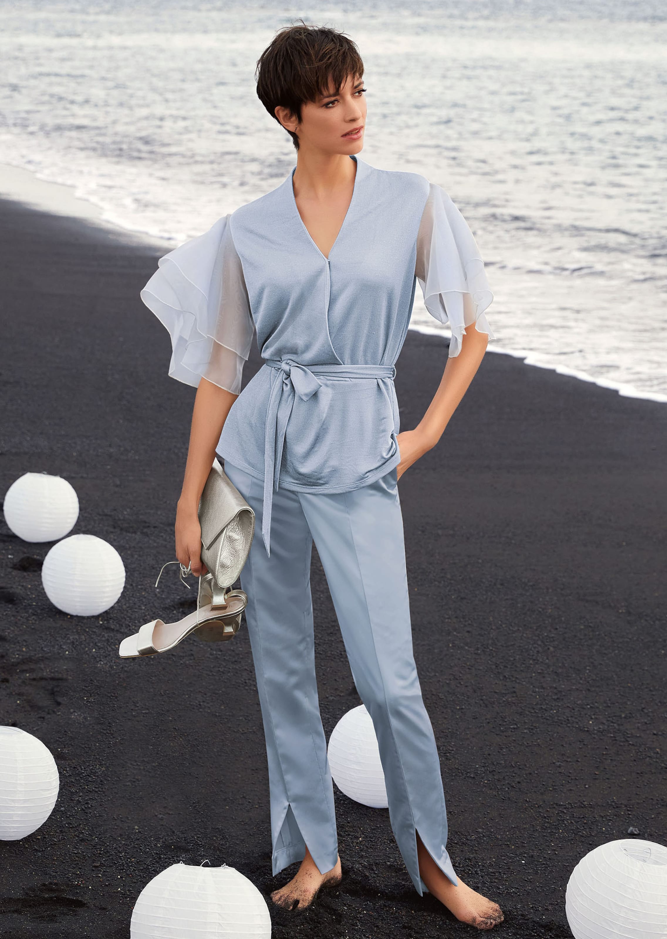 Bluse im Metallic-Look mit transparenten Ärmeln
