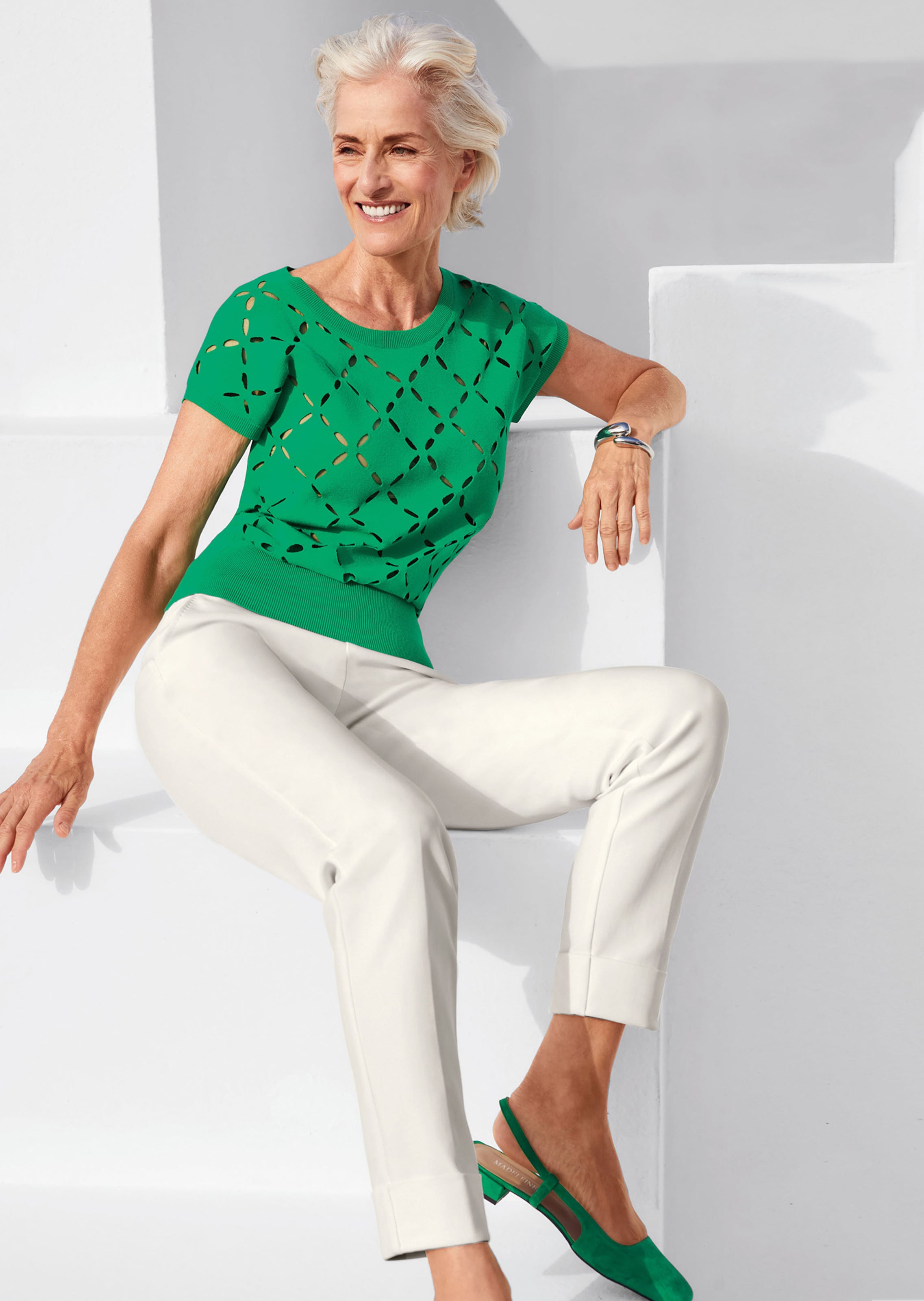 Jumper with cut-outs in apple green | MADELEINE Fashion