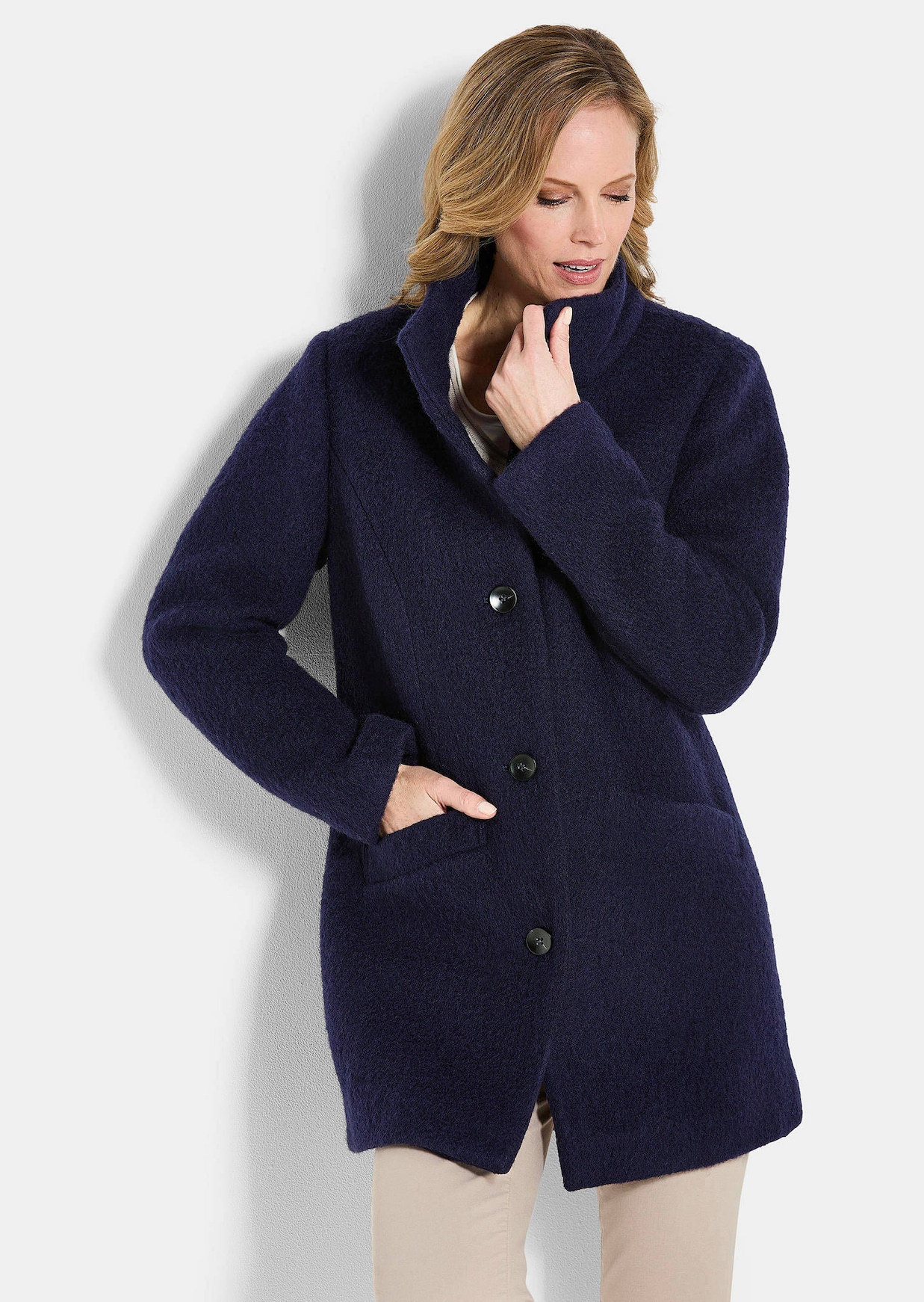Manteau laineux avec col montant