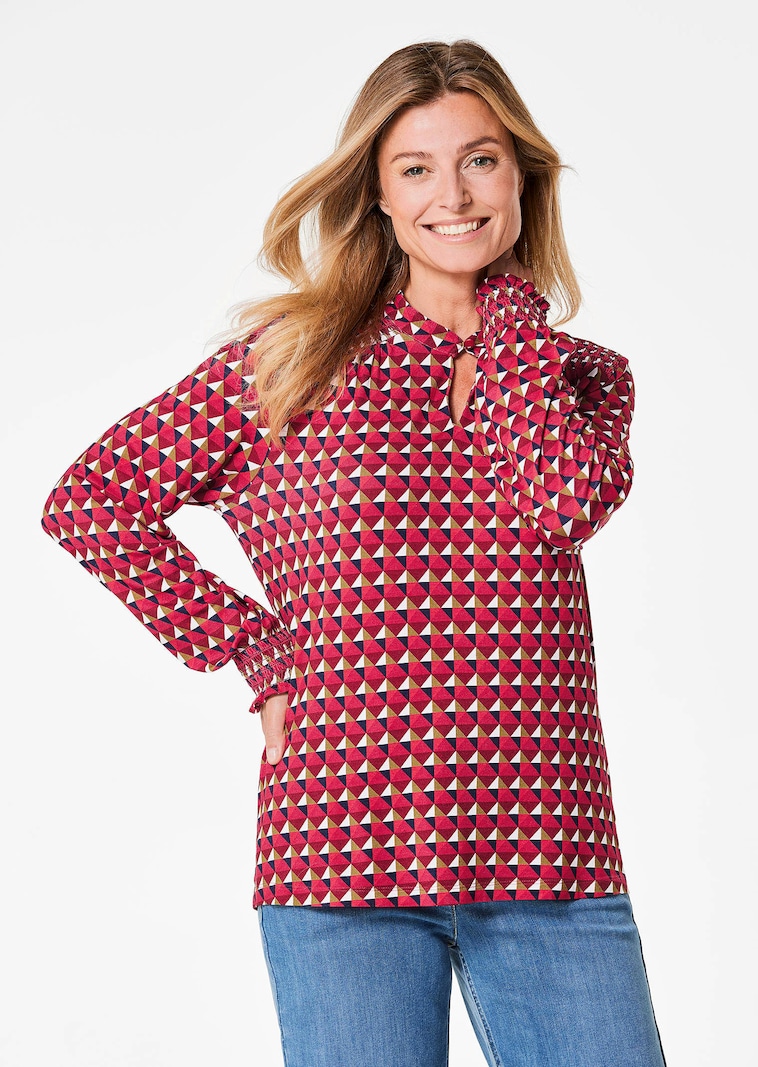 Jersey blouse met modieuze smokwerkdetails