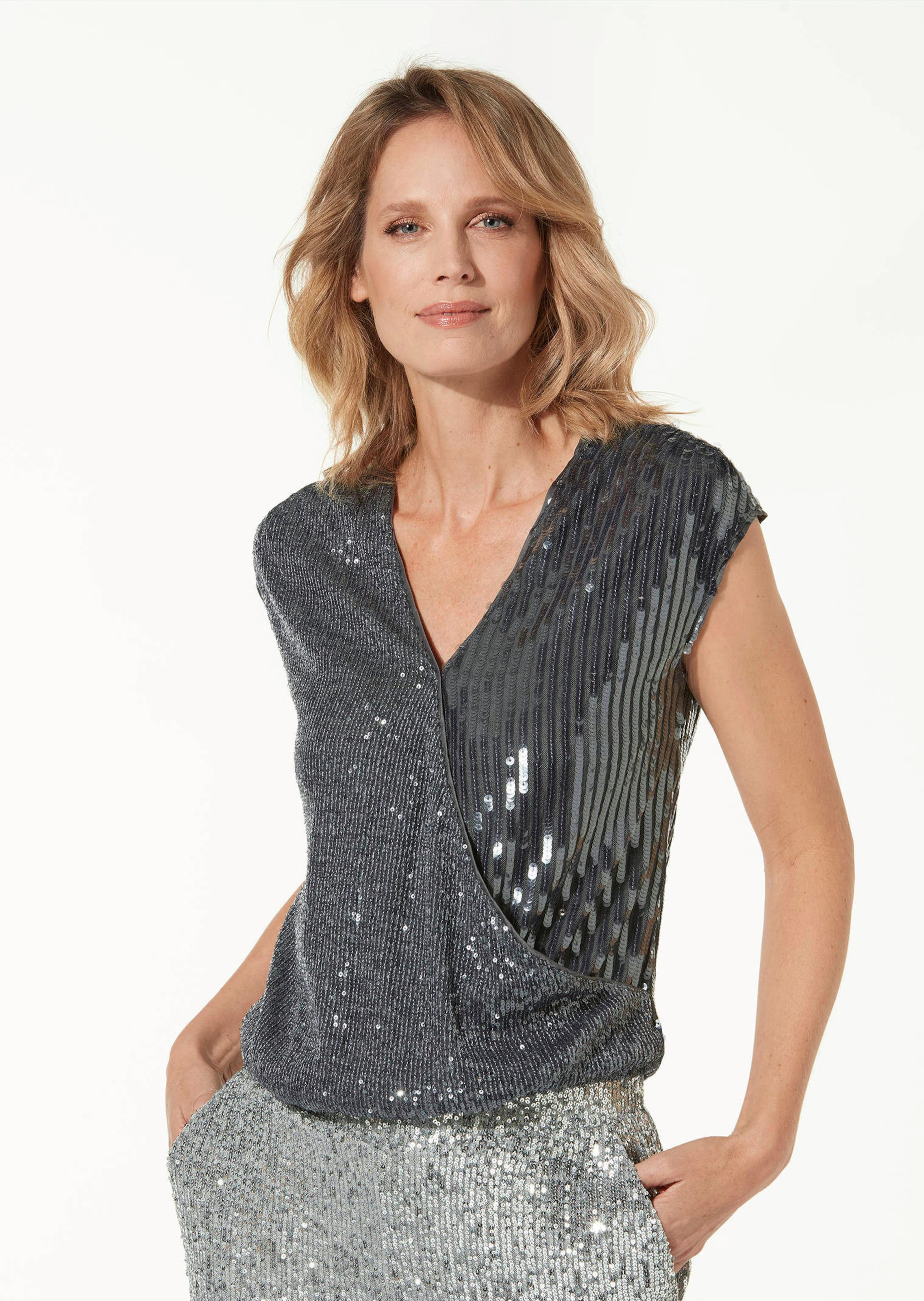 Elegantes Paillettenshirt in Wickeloptik