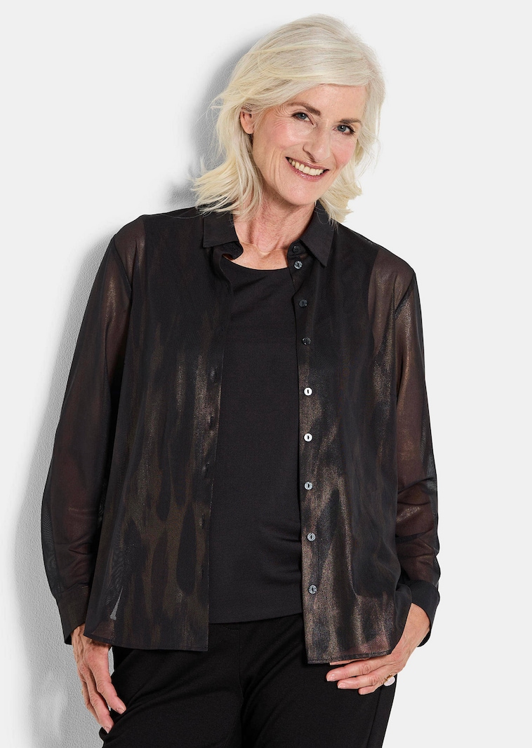 Bluse aus semitransparentem Mesh