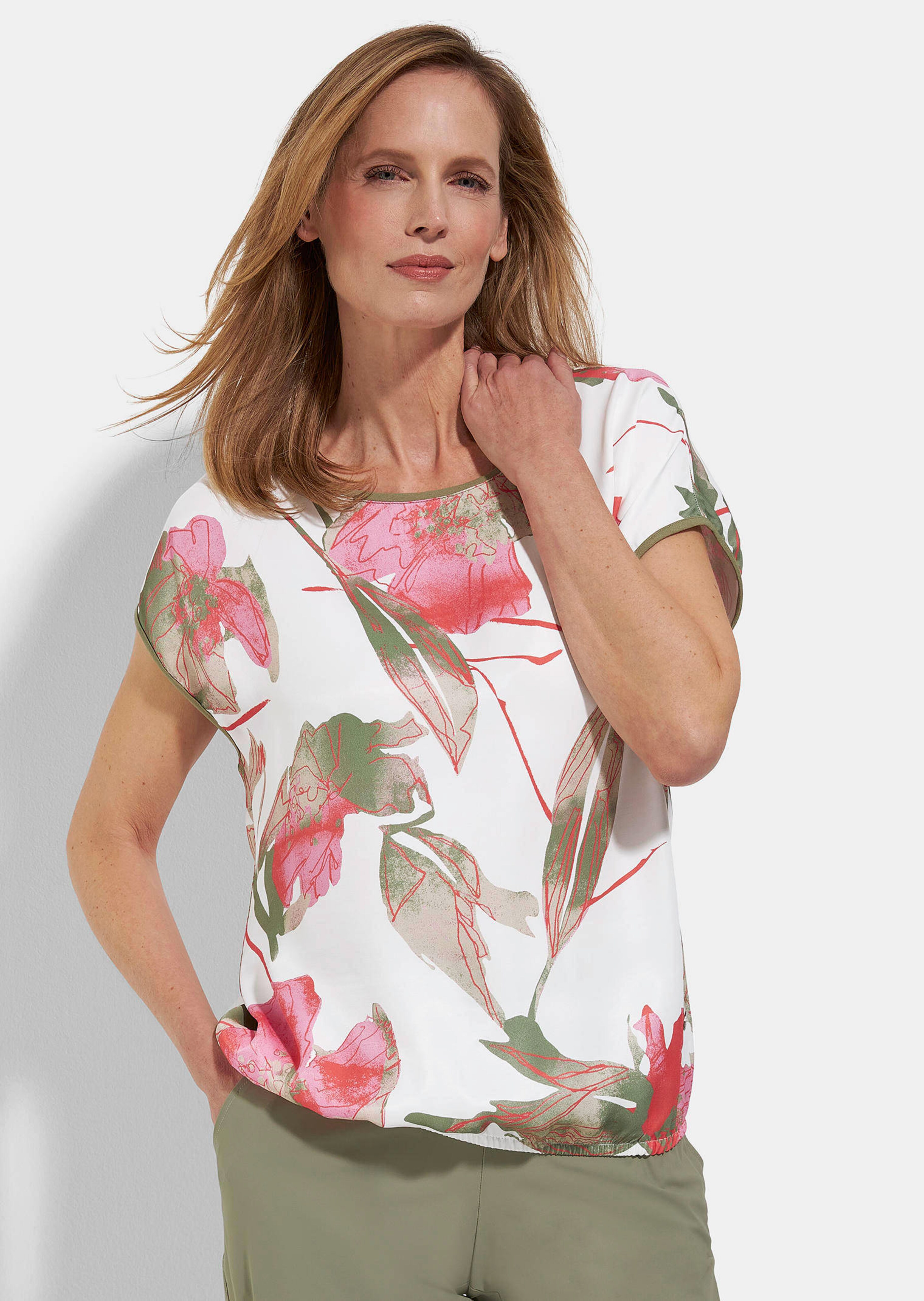 Blouse raffinée, résolument féminine, avec motif floral