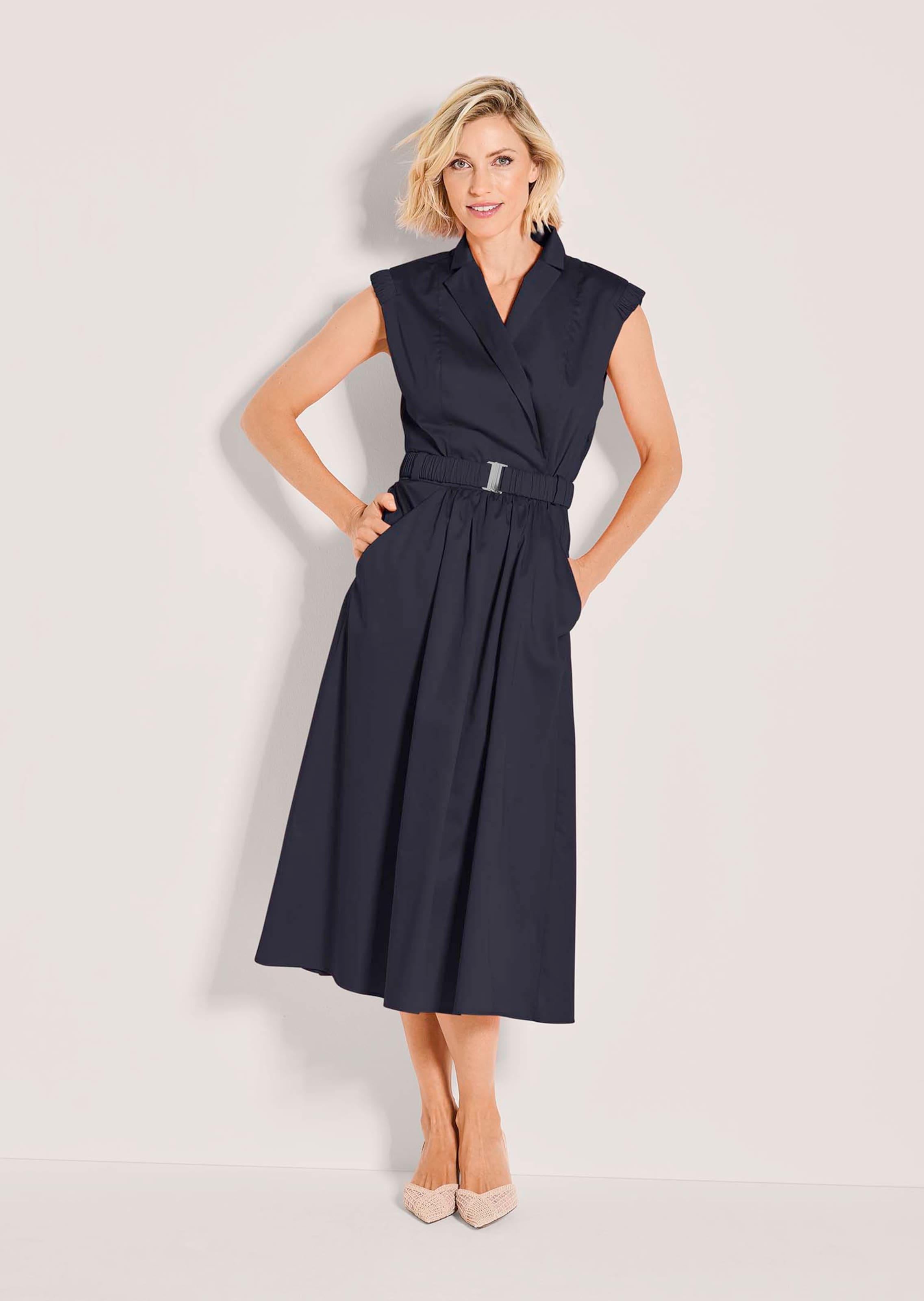 Sleeveless summer dress with gathers