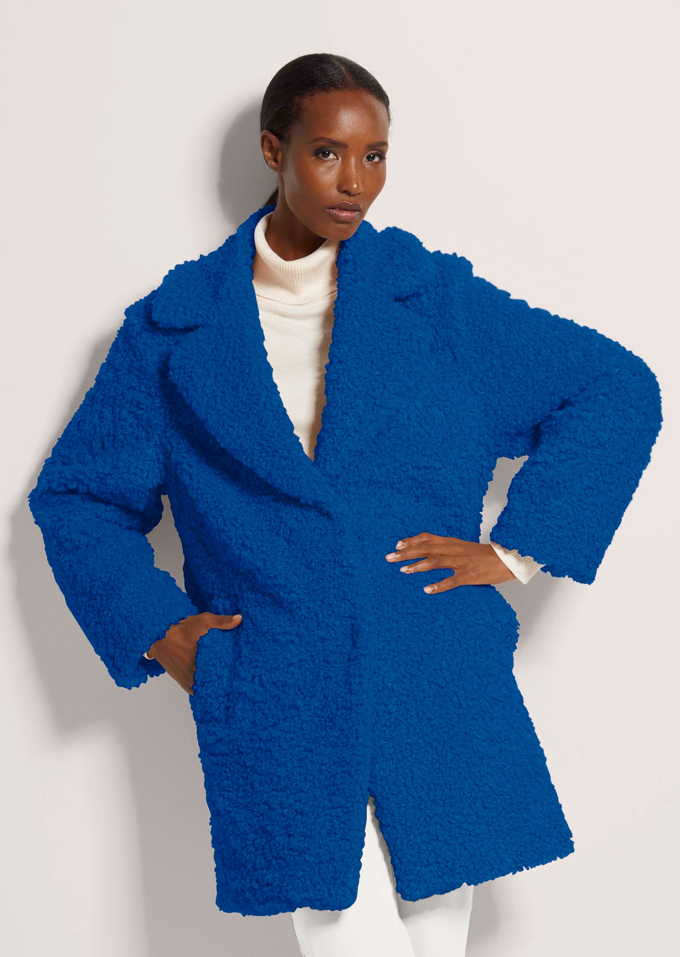 Manteau en peluche à col à revers