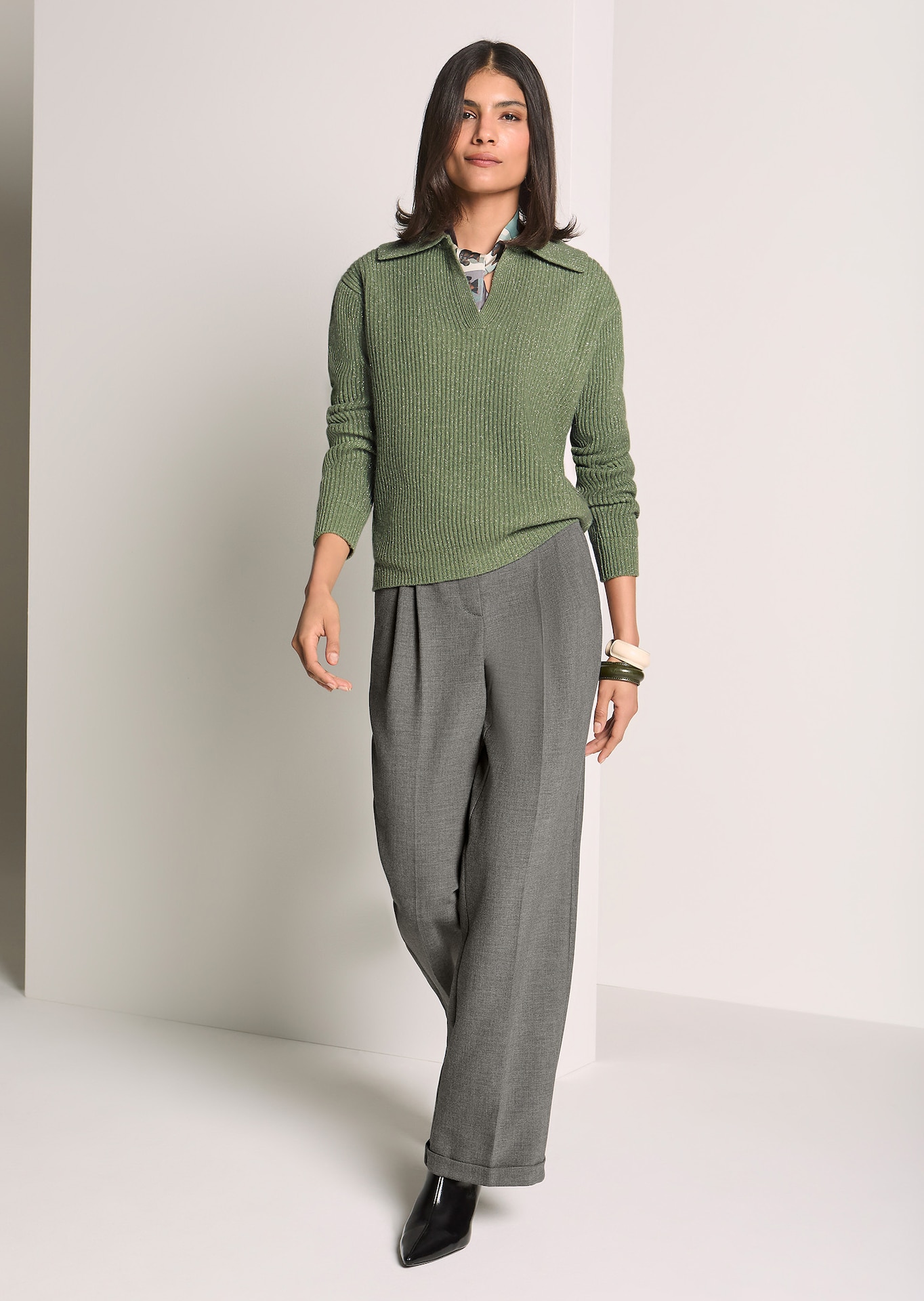 Wide-leg trousers with faux leather decorative fastening