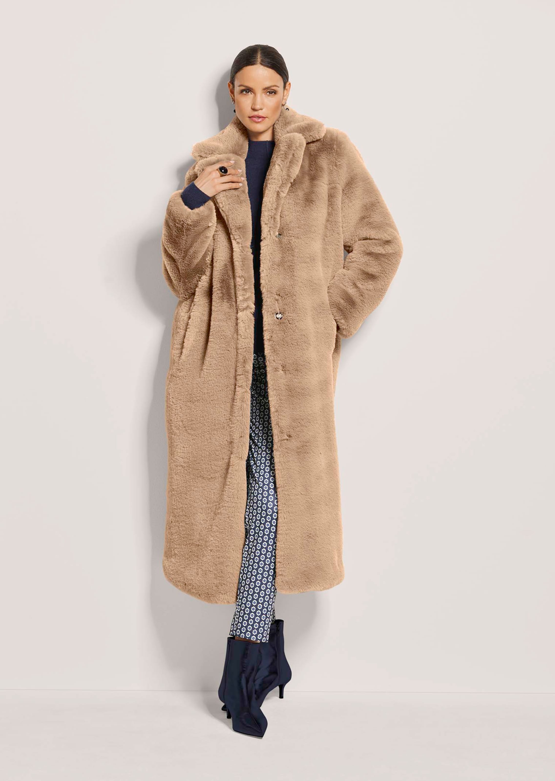 Manteau long en fausse fourrure