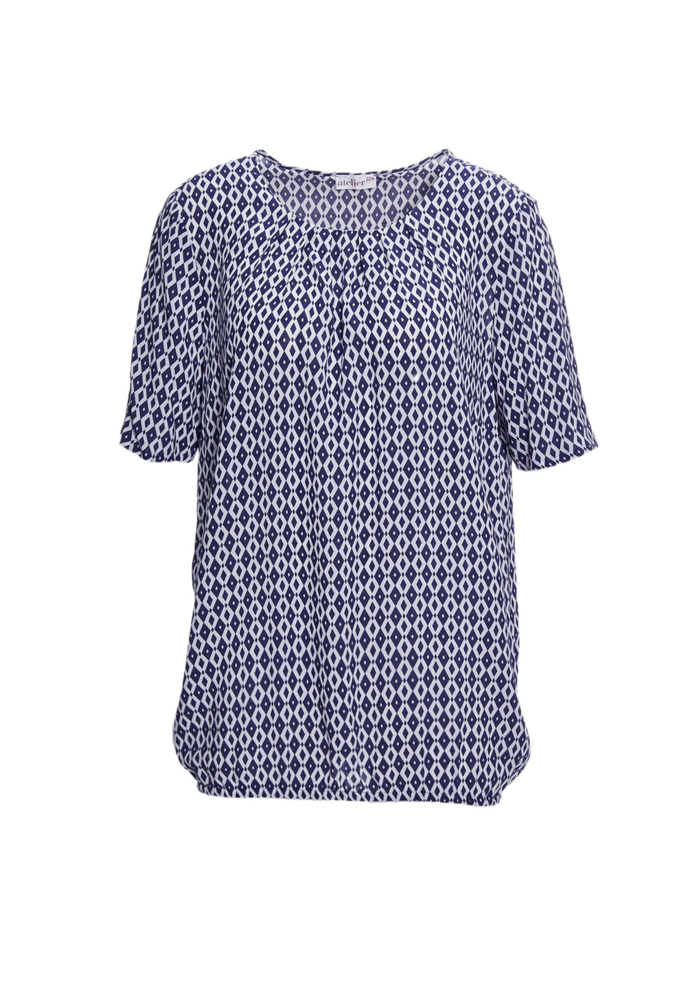 Helder gekleurde, gedessineerde blouse met charmante details
