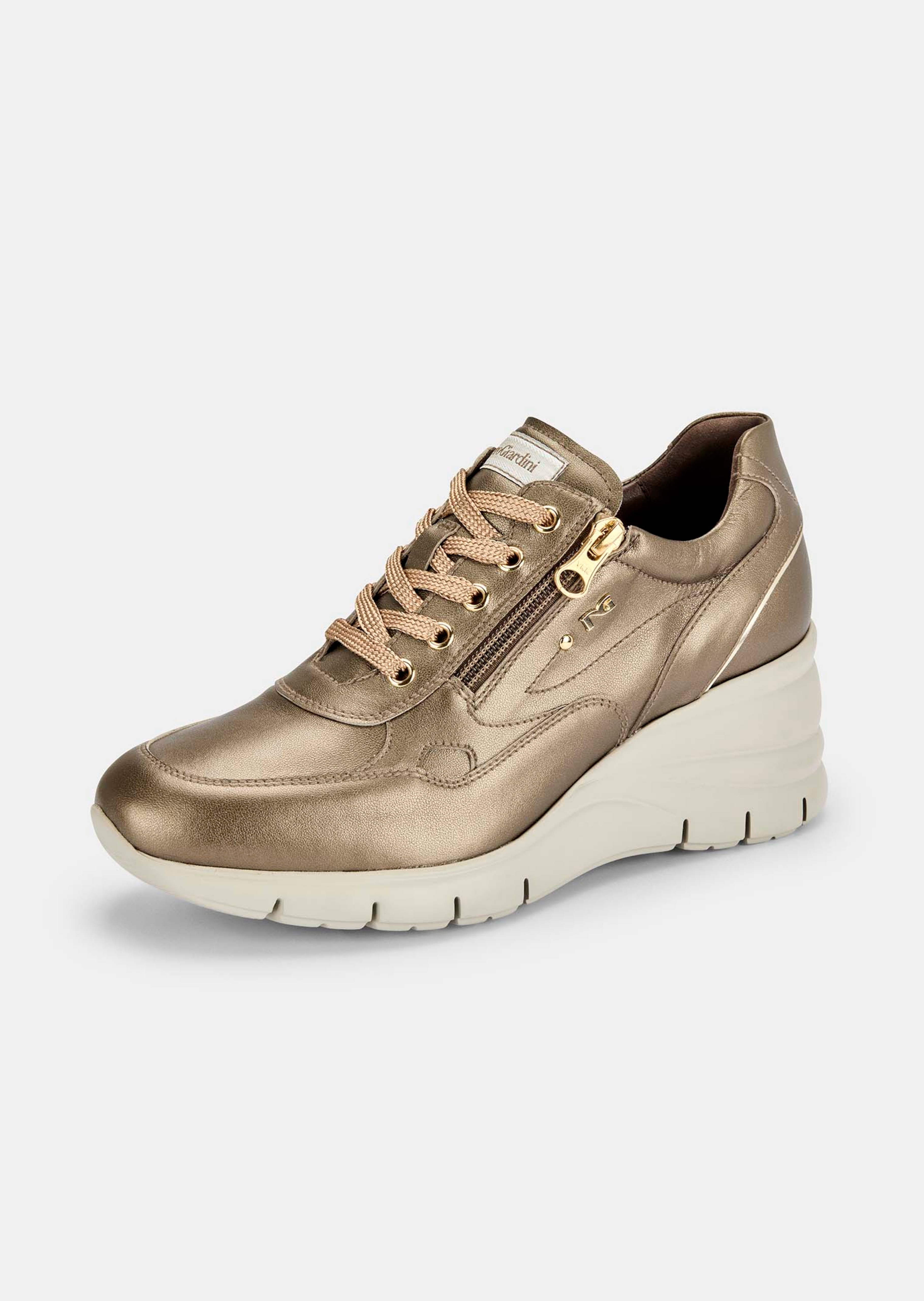 Trainers with an integrated wedge heel