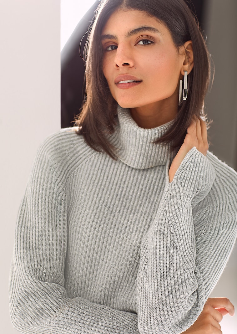 Schimmernder Rollkragen-Pullover mit Raglanärmeln