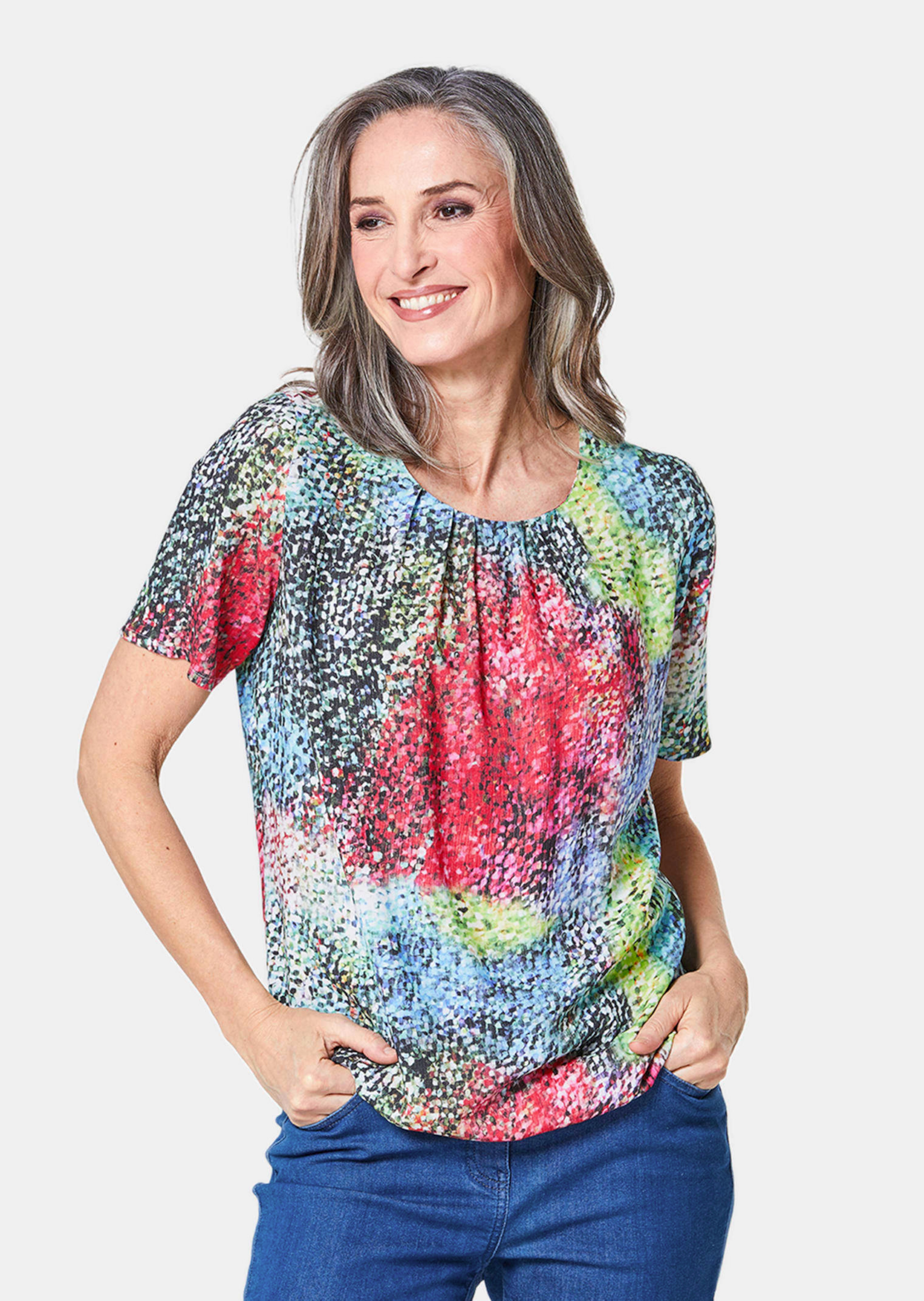 Farbbrillante Druckbluse mit liebevollen Details