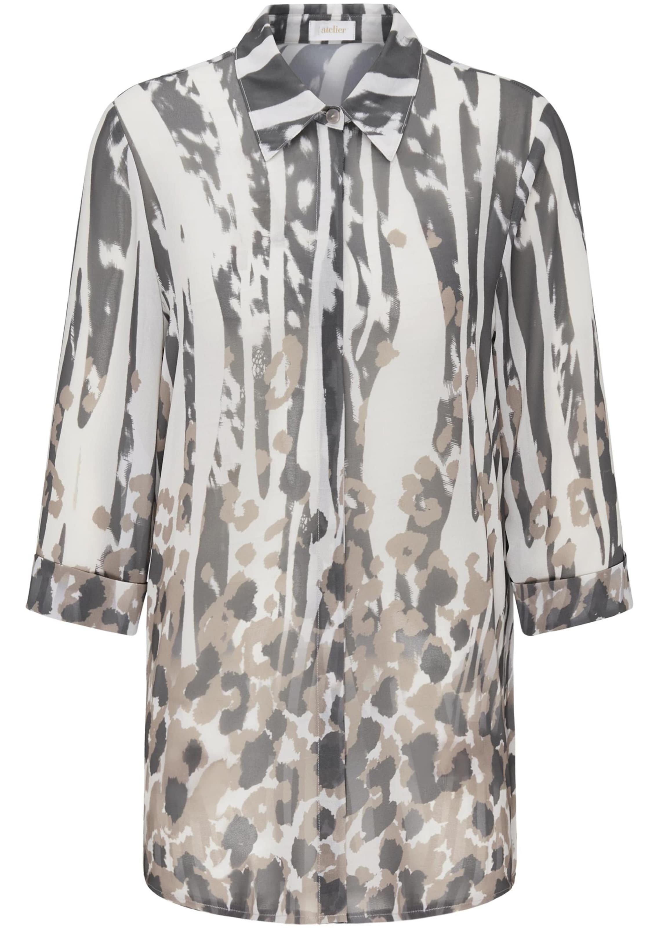Pflegeleichte Druckbluse im Muster-Mix