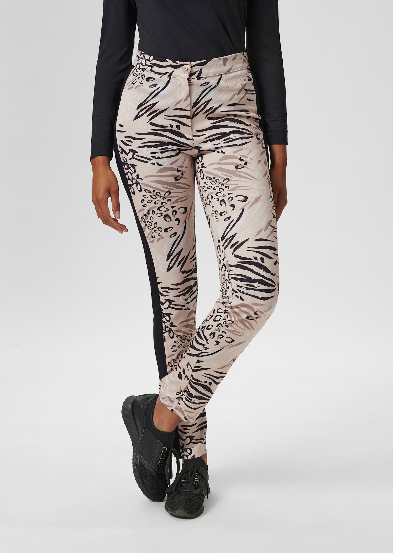 Slimline trousers with abstract print and decorative stripes