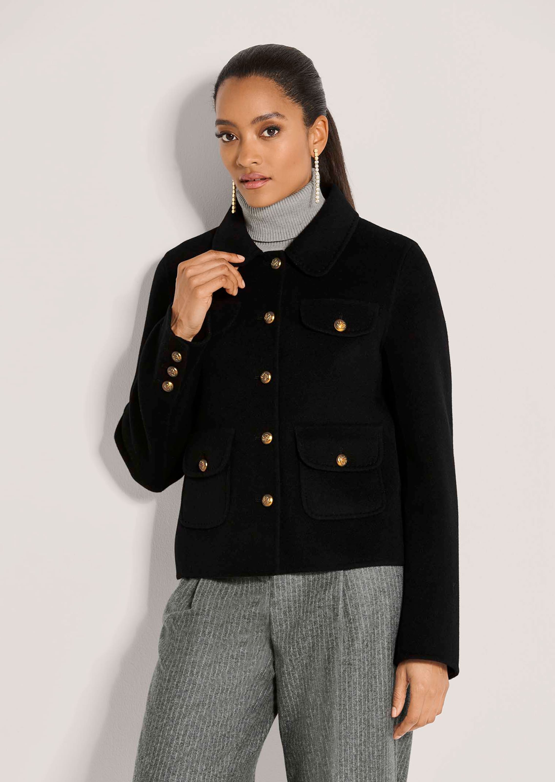 Double-faced jacket with a fashionable utility design