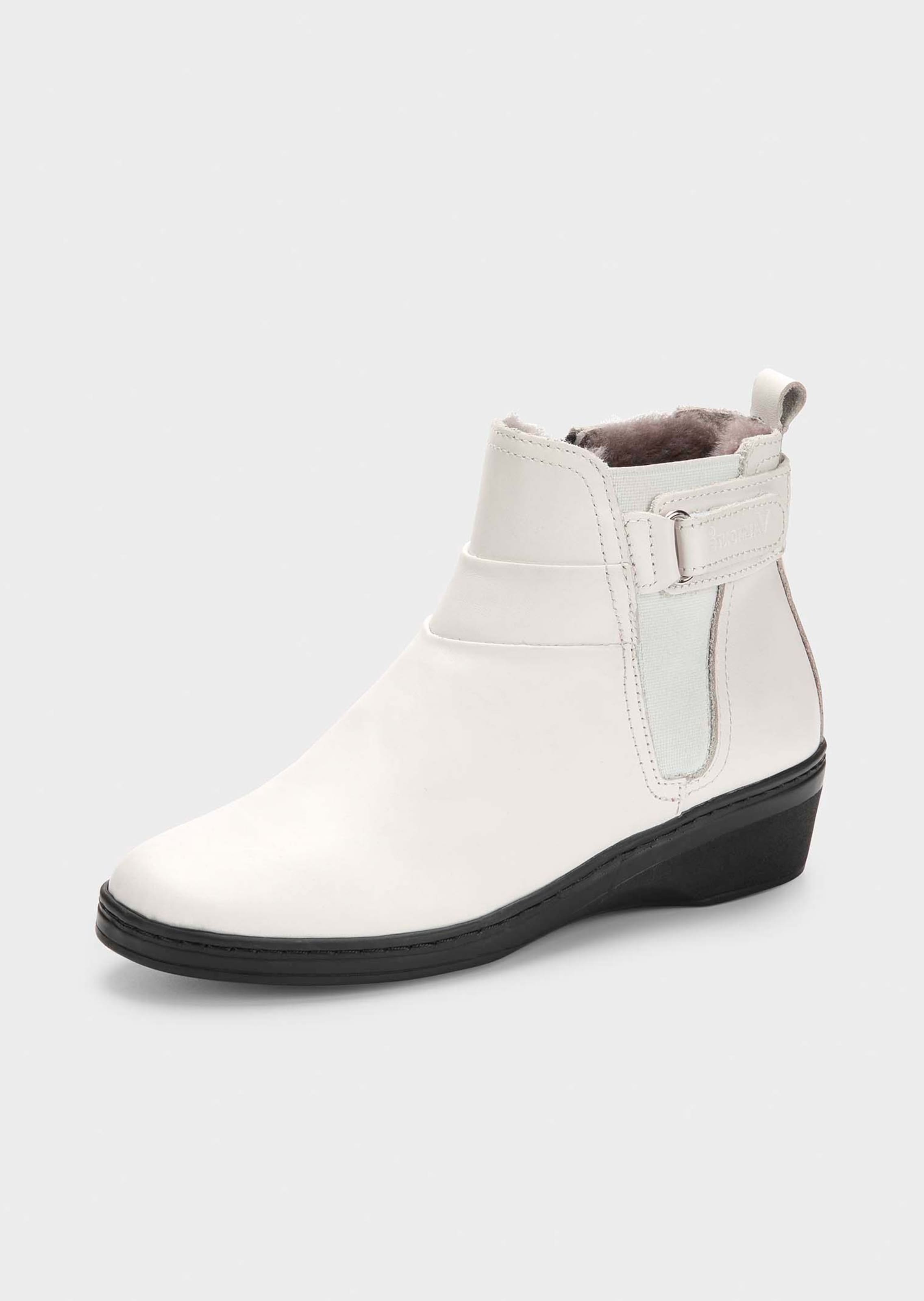 Bottines avec fourrure d'agneau