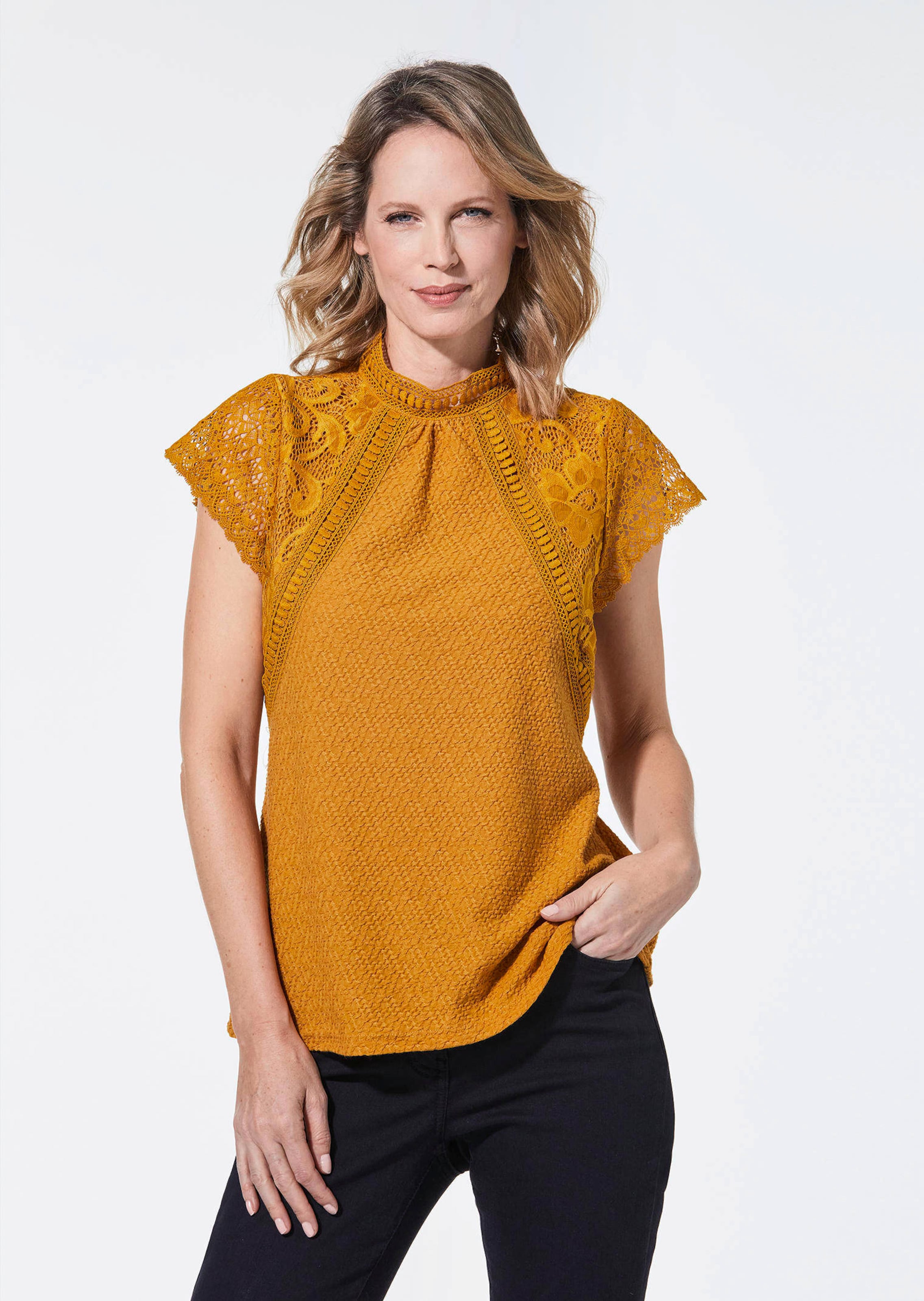 Elegantes Spitzenshirt mit Häkelspitze