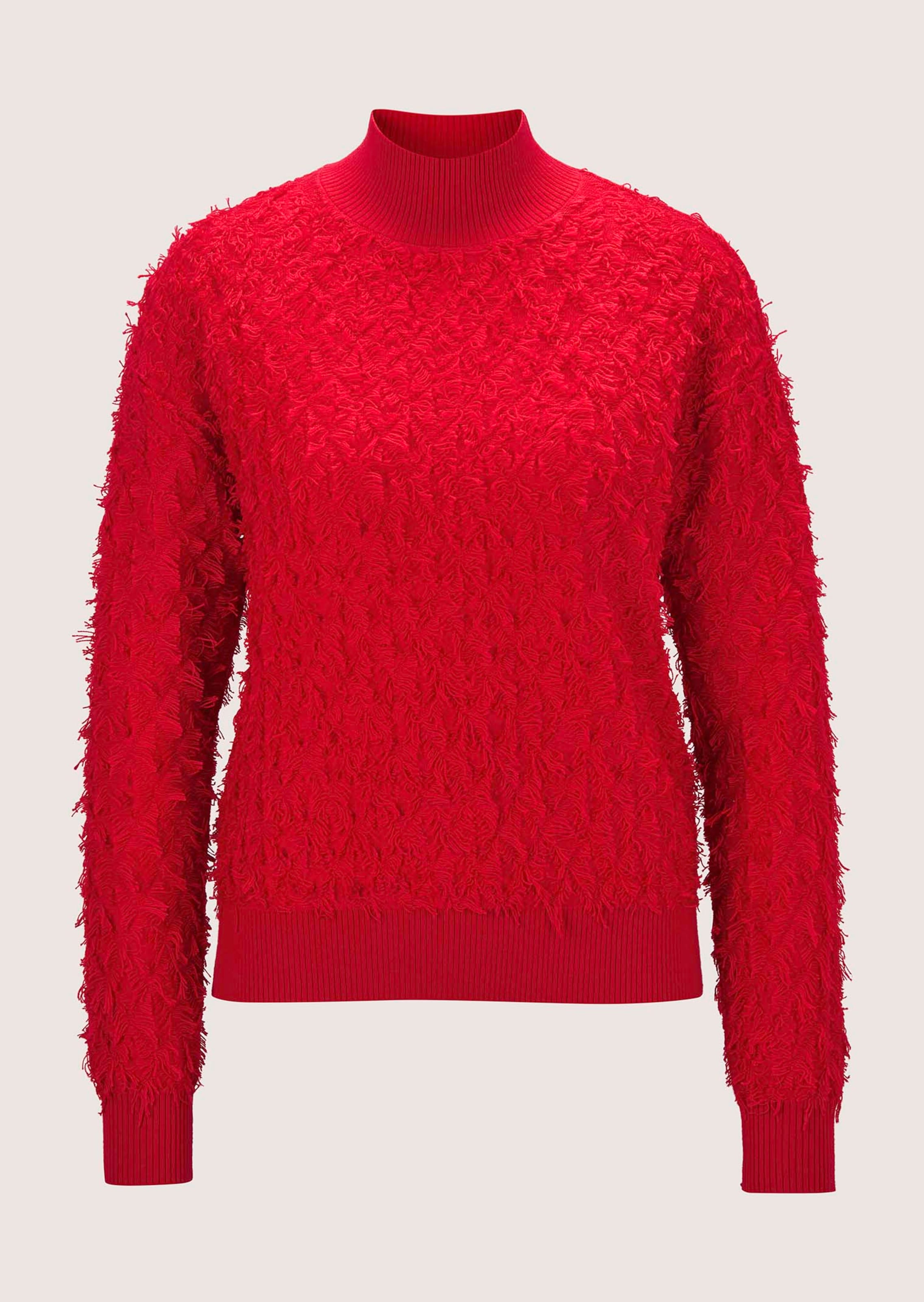 Knitted jumper with fringed pattern
