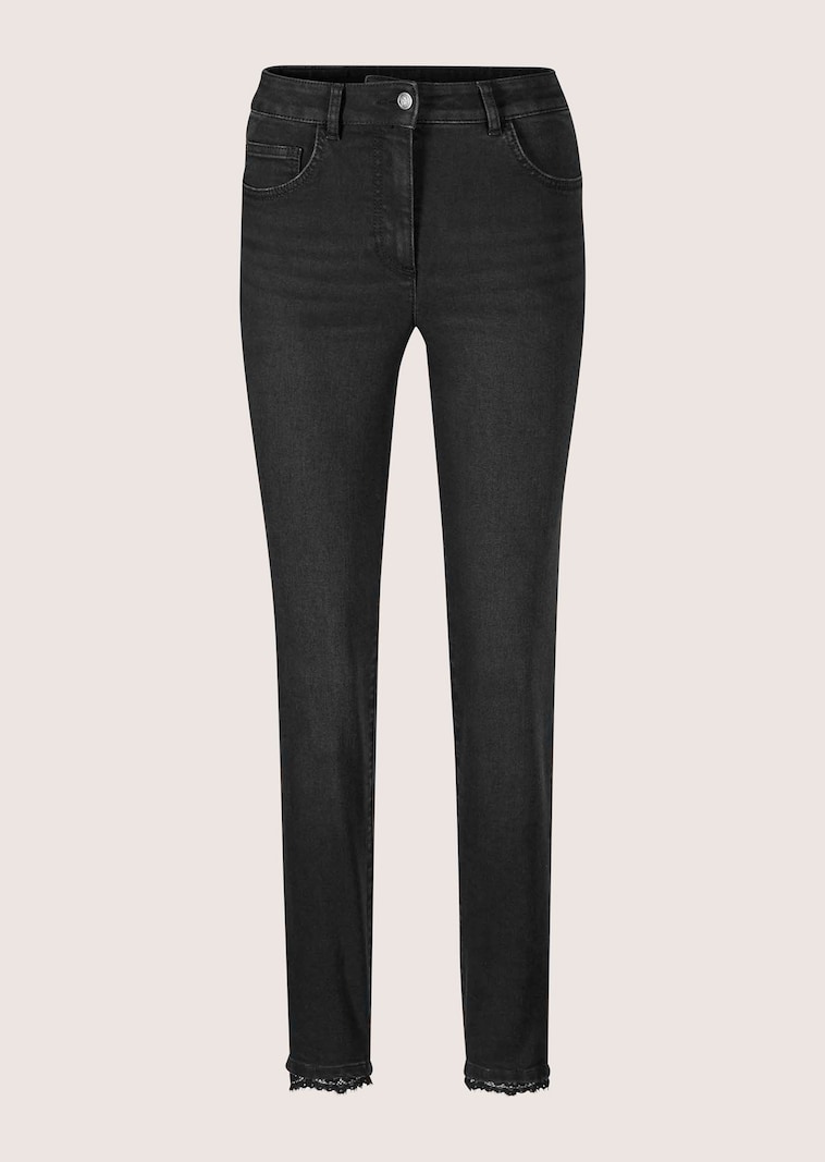 Slim-fit jeans with lace hem detail