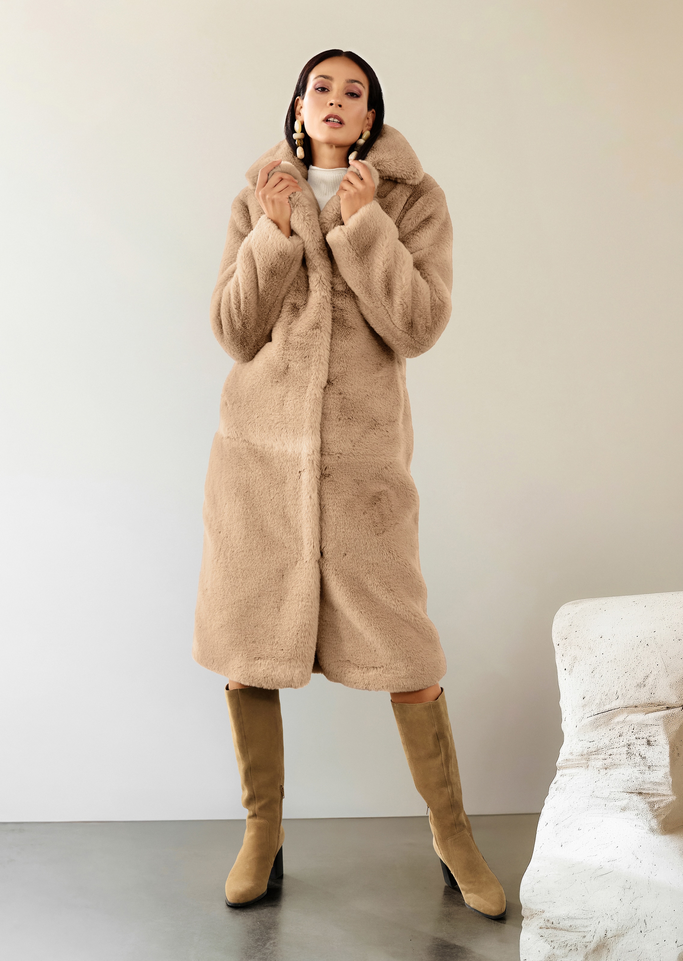 Manteau long en fausse fourrure