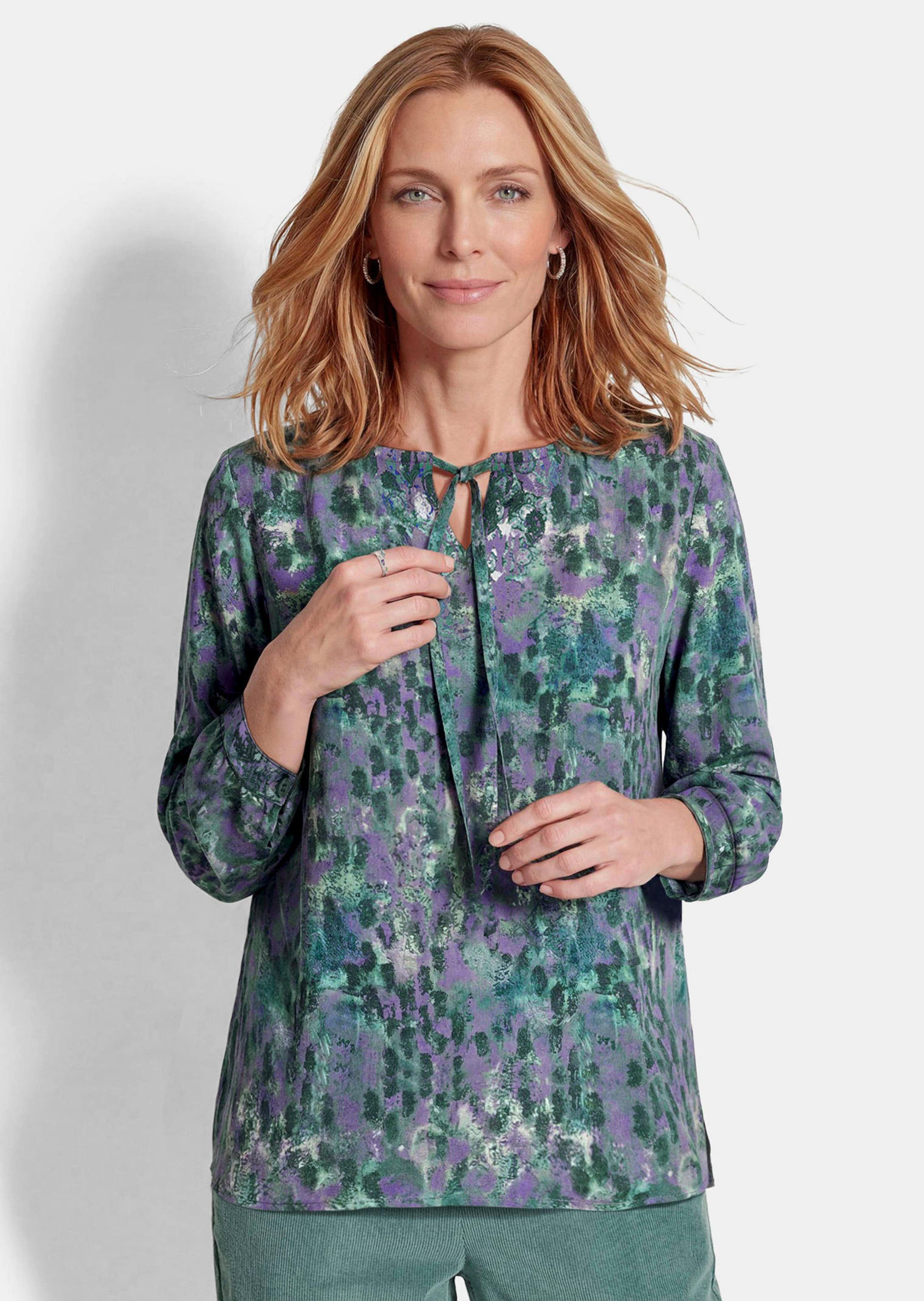 Viscose blouse met ronde hals en strikceintuurtje