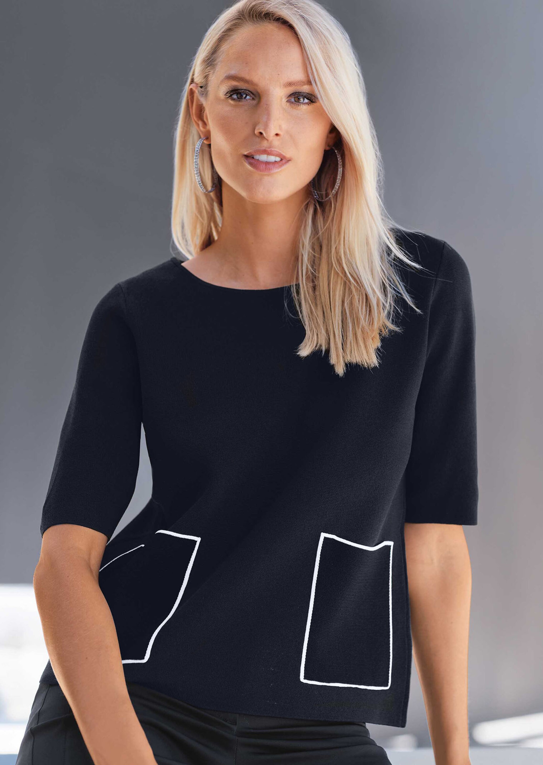 Pull manches courtes avec poches plaquées