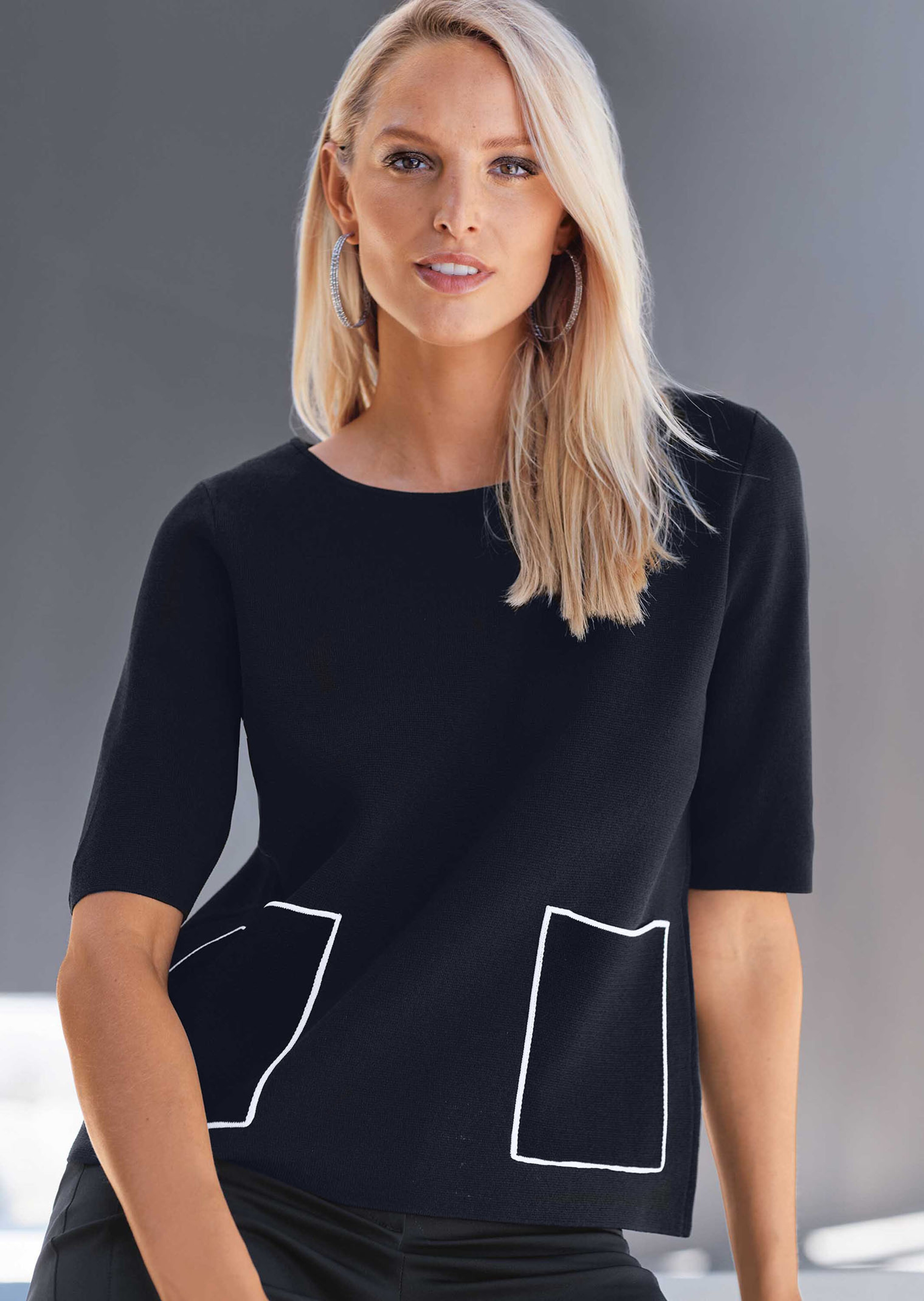 Pull manches courtes avec poches plaquées