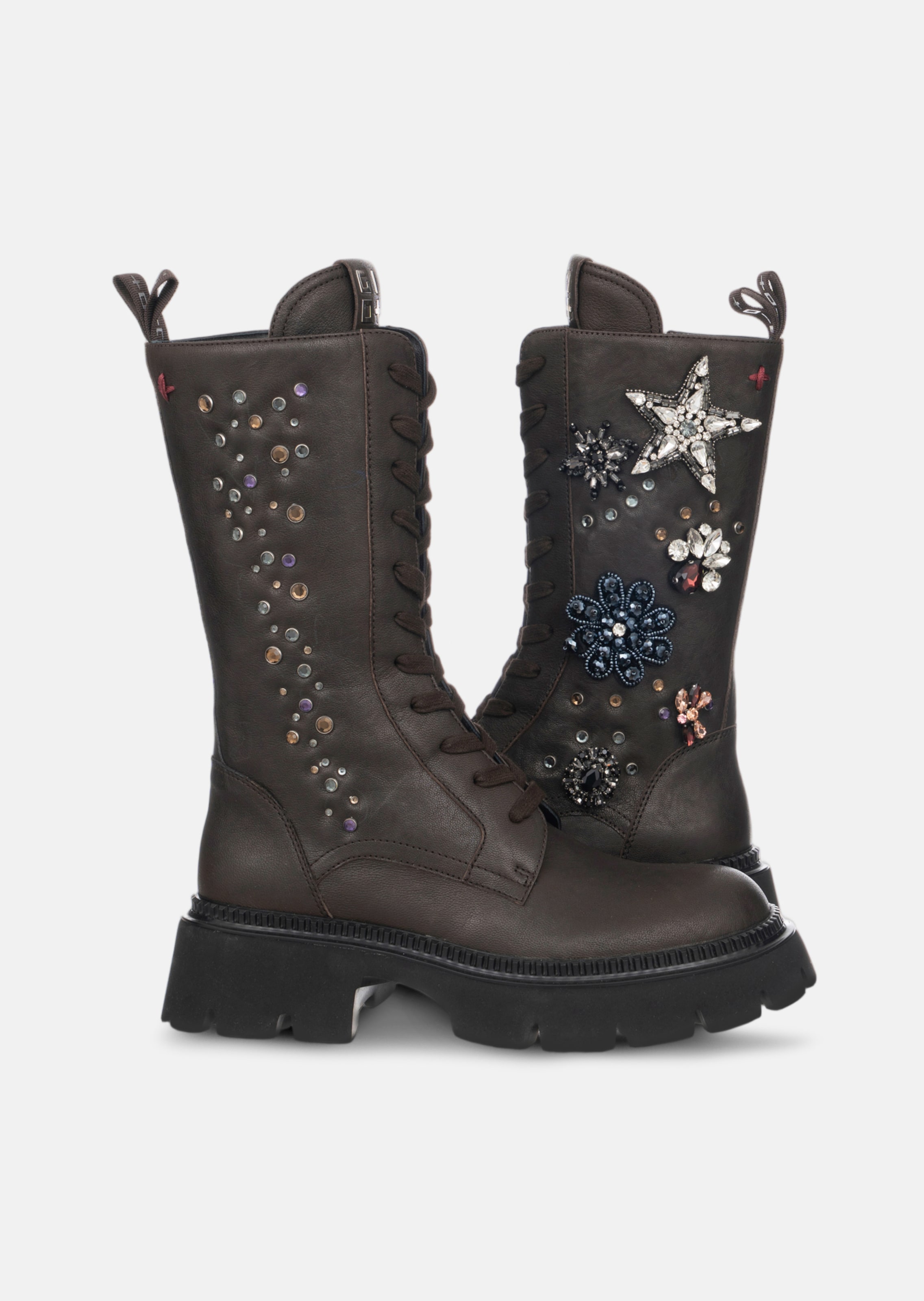 Hohe Boots mit Glitzer-Ornamenten