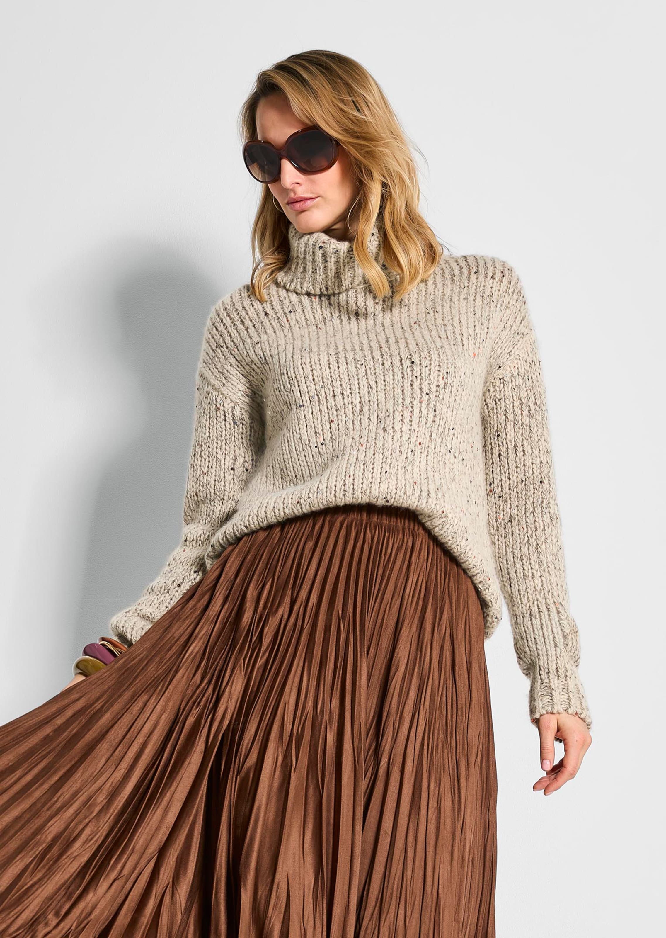 Rollkragenpullover mit Pailletten