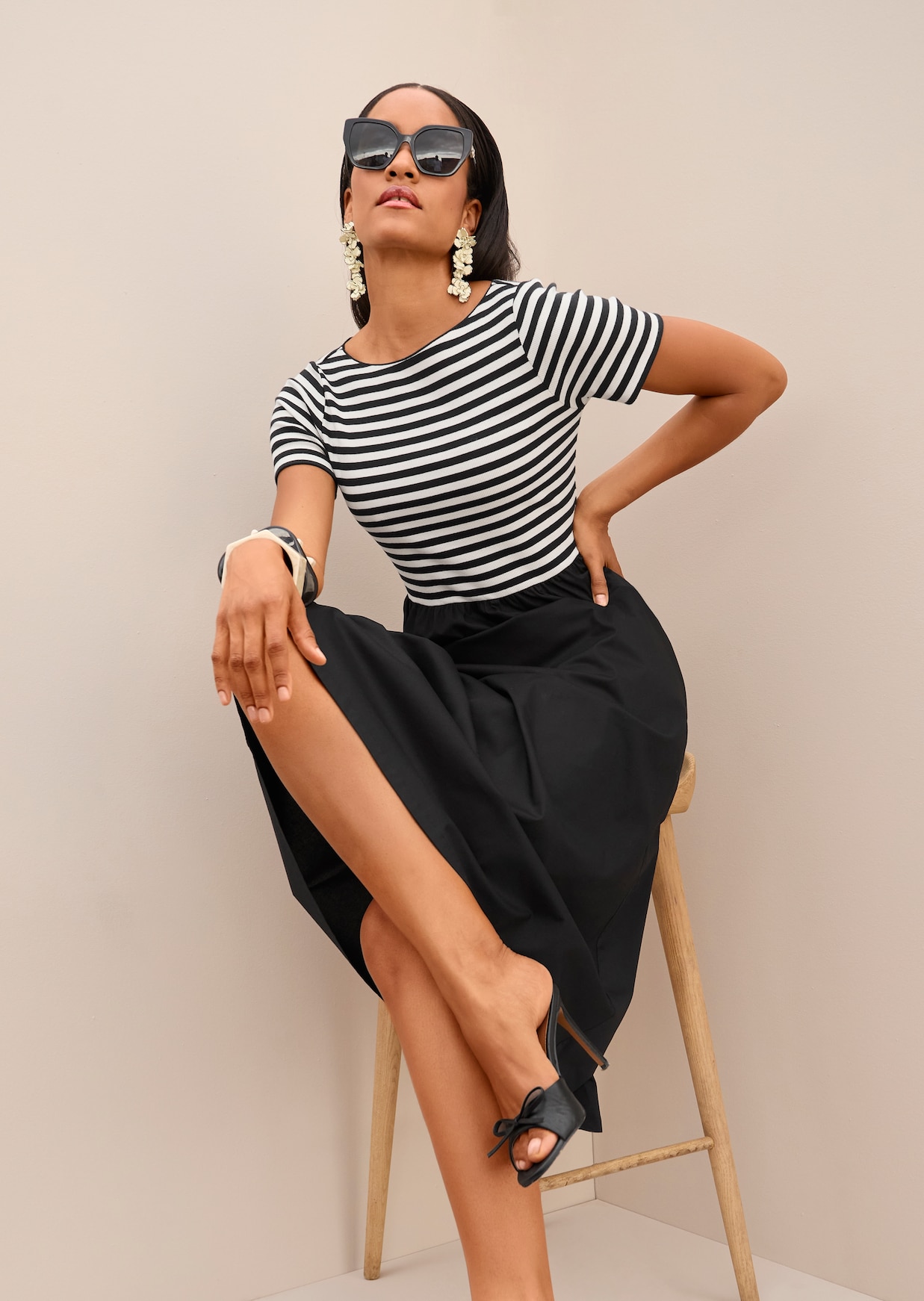 Striped dress in a mixed-fabric design
