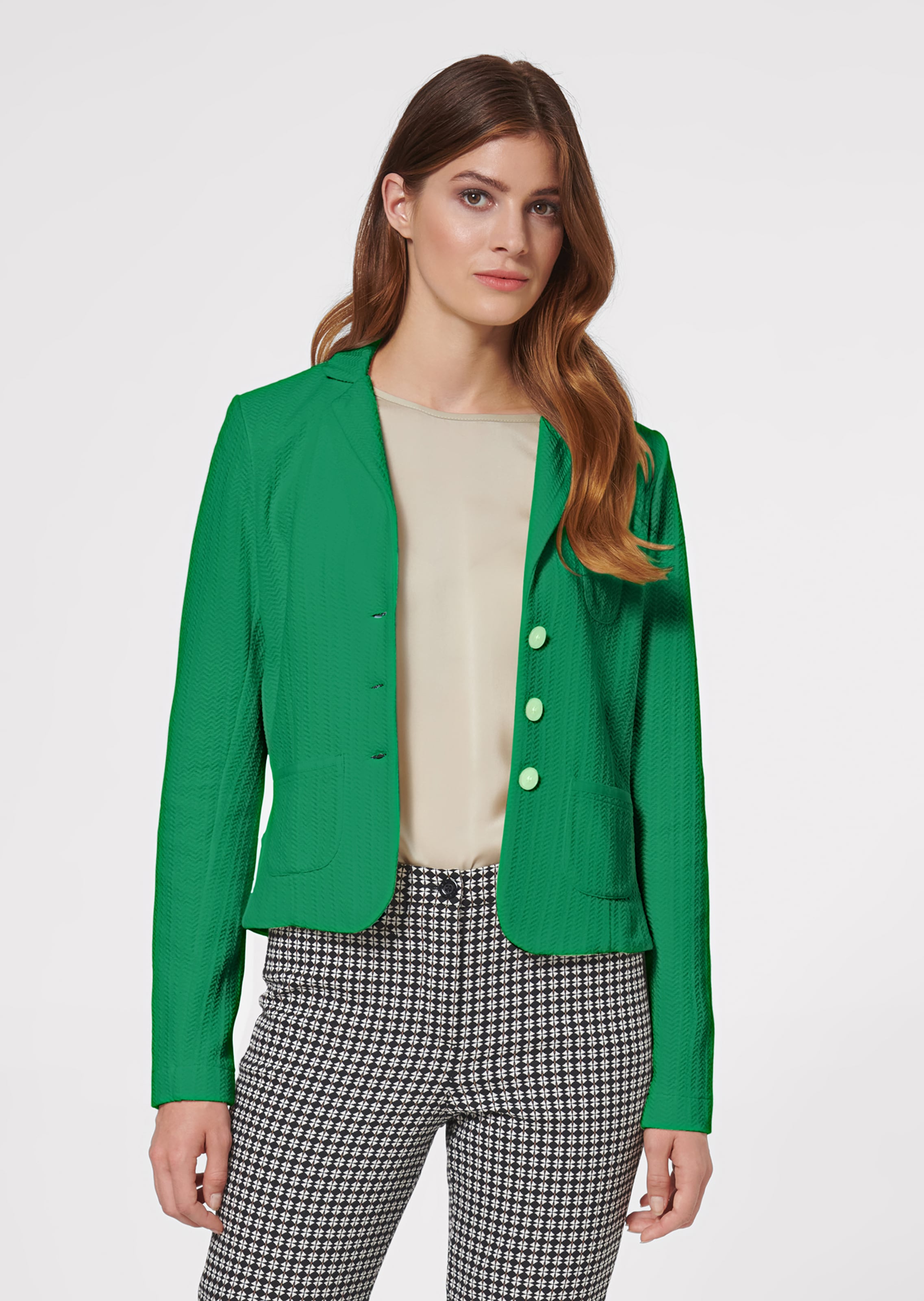 Trendy short-cut blazer in jersey with structured sections