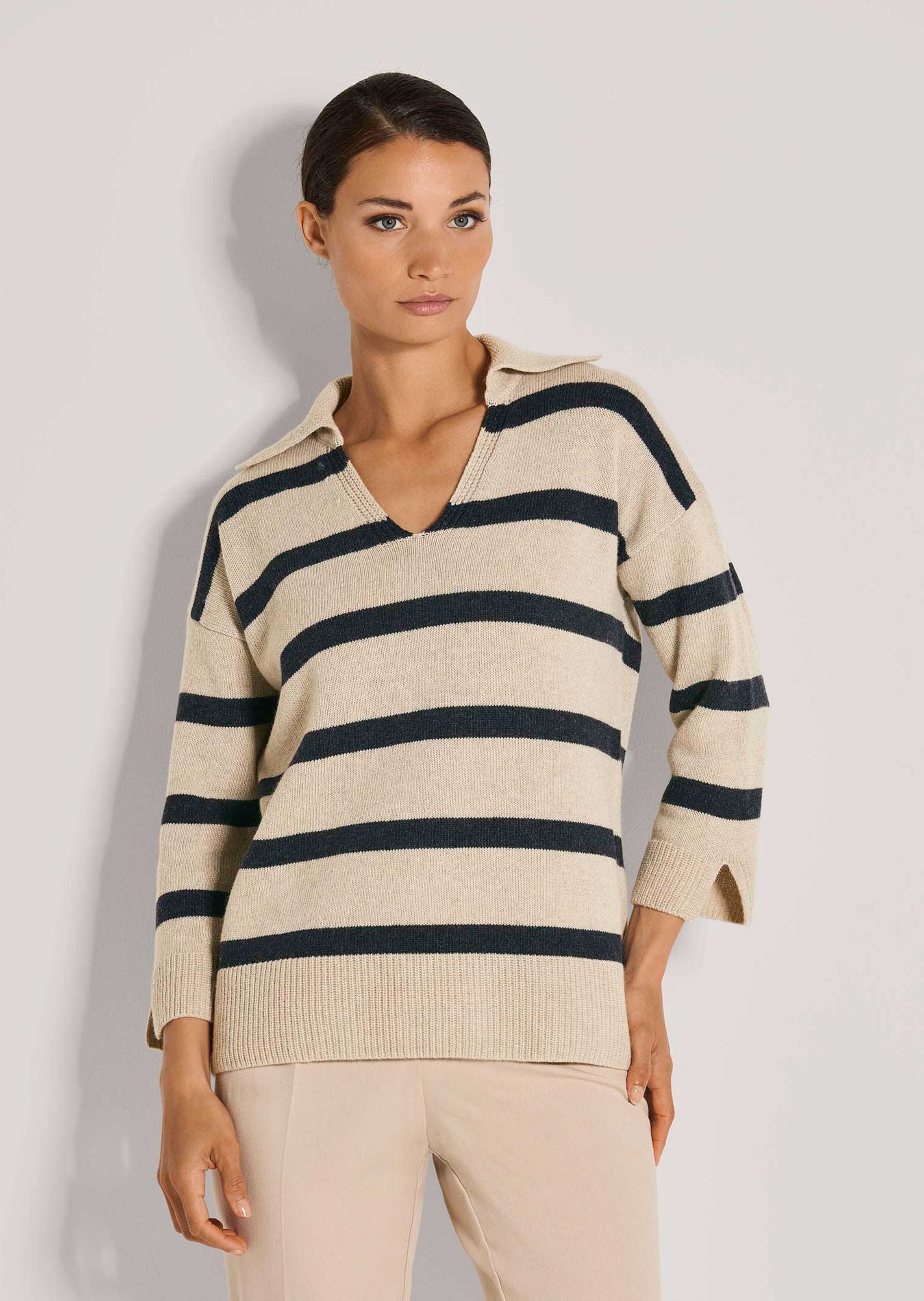 Pull rayé avec col polo