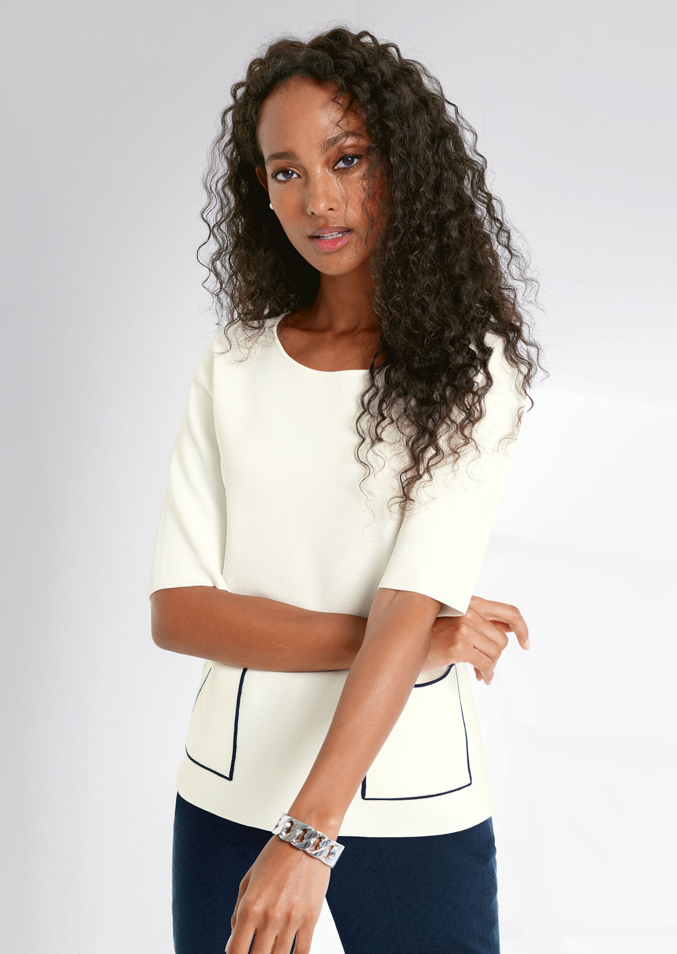 Pull manches courtes avec poches plaquées
