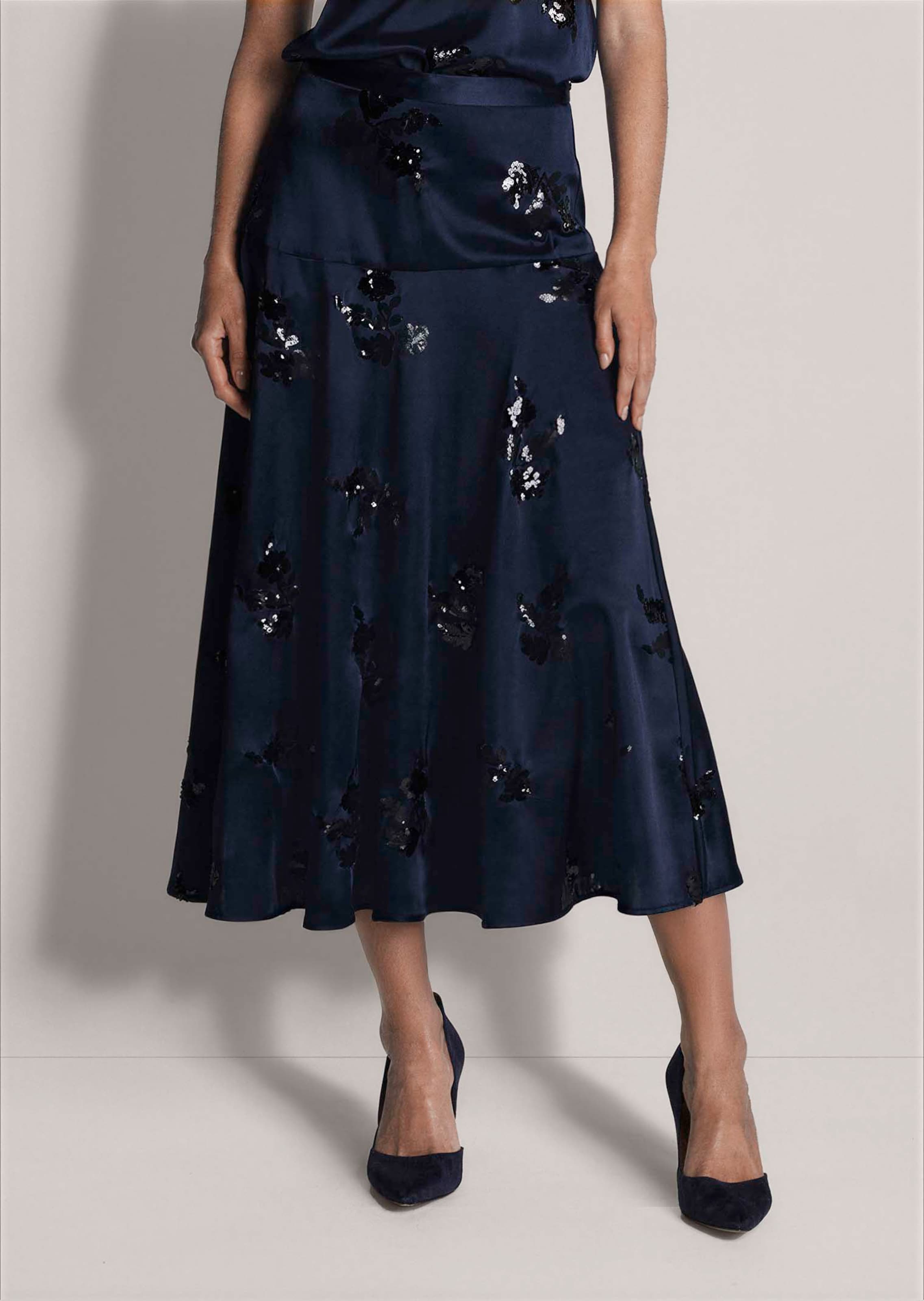 A-line satin skirt with sequin motifs