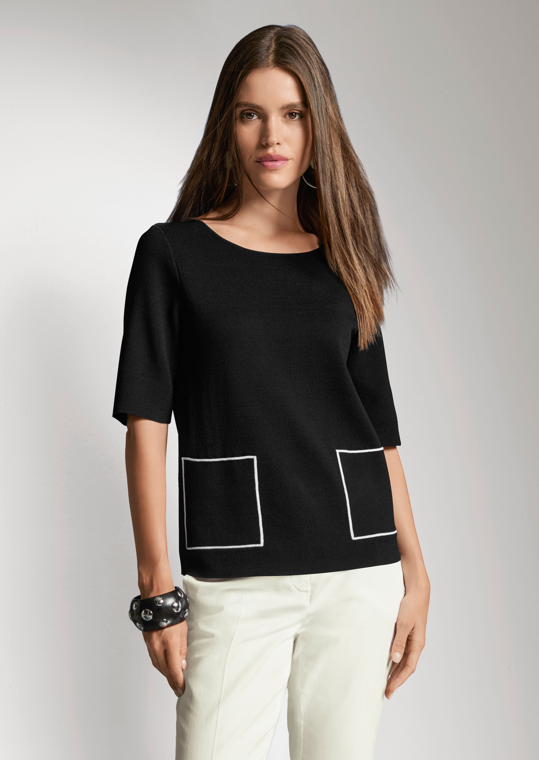 Pull manches courtes avec poches plaquées