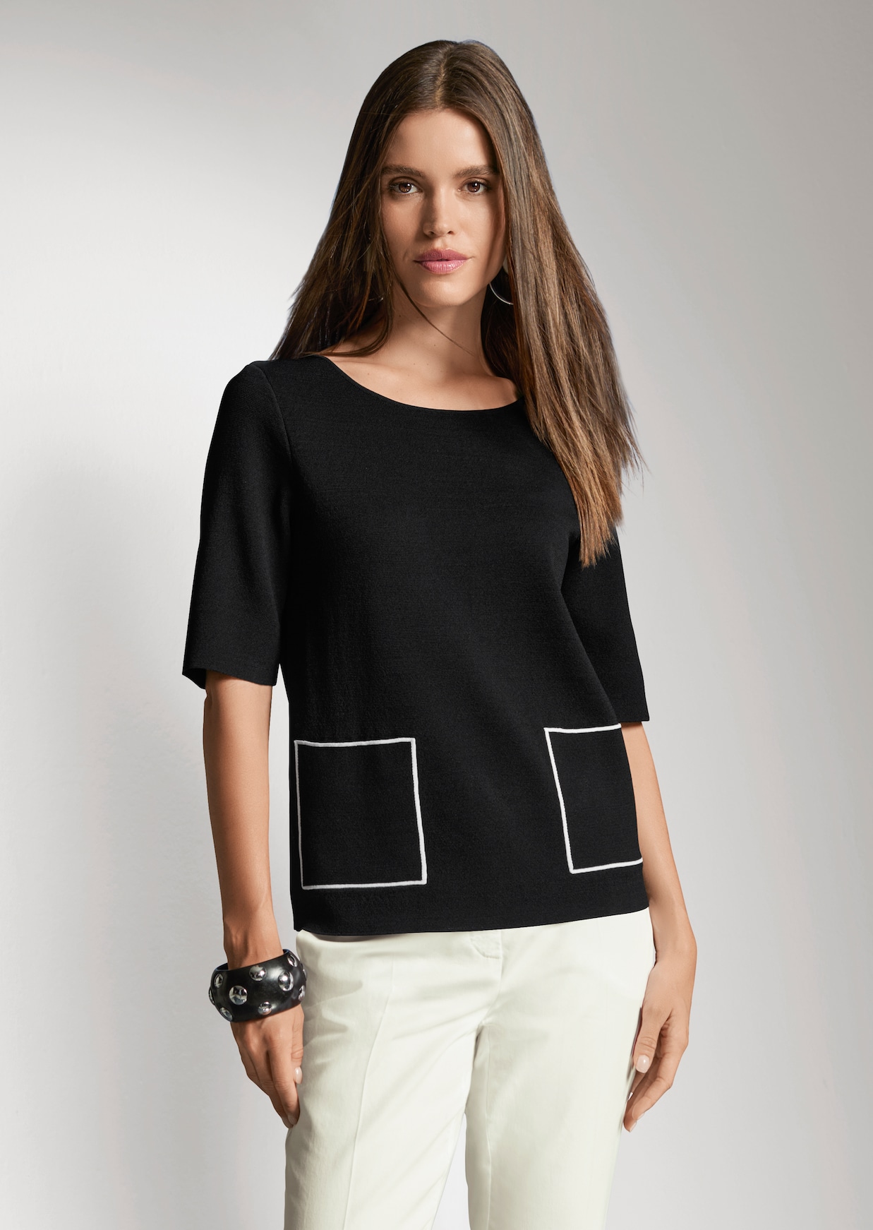 Pull manches courtes avec poches plaquées
