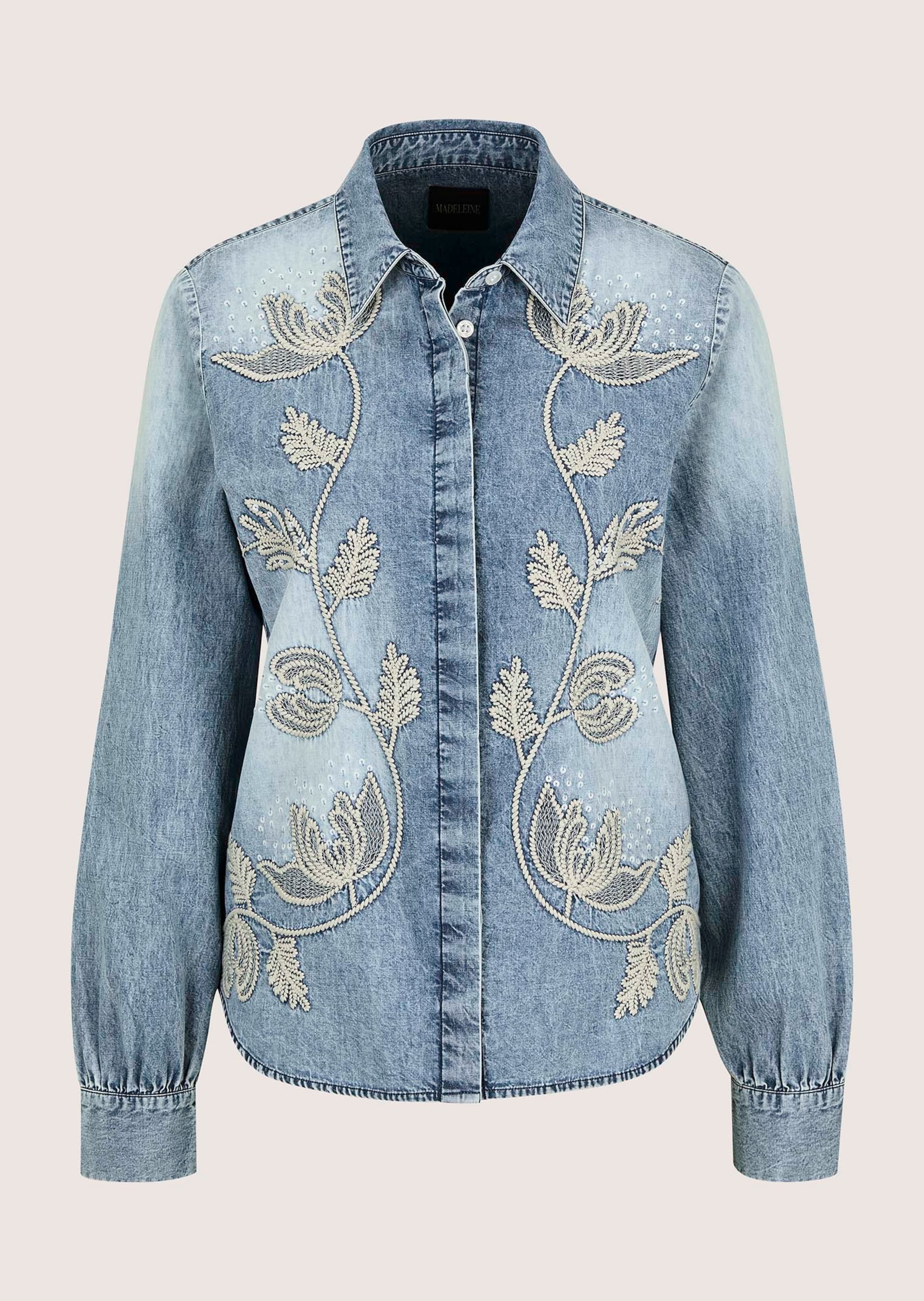 Denim blouse featuring floral embroidery