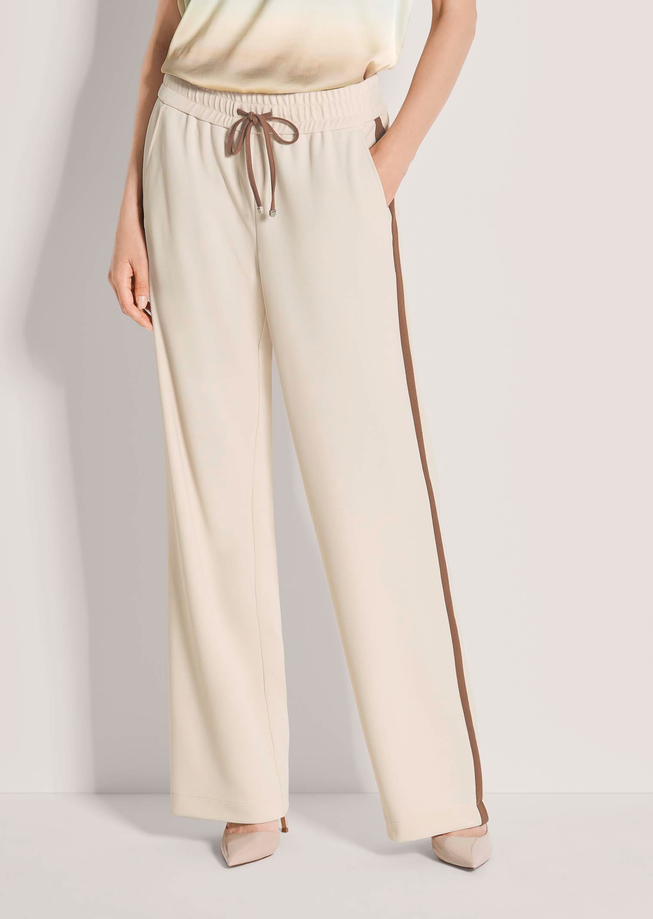 Pantalon avec bande latérale et effet crêpe